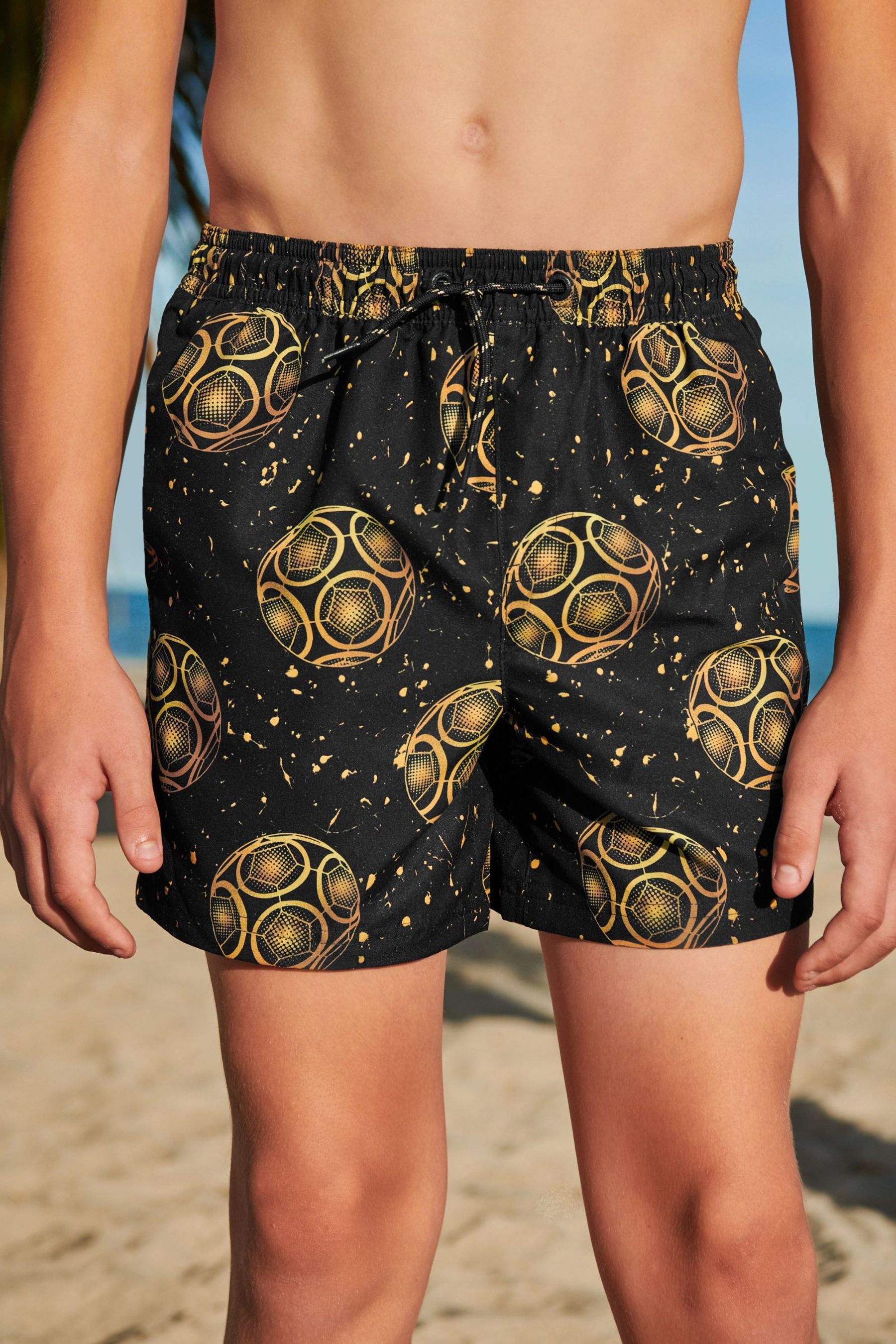 Gold swim shorts hotsell