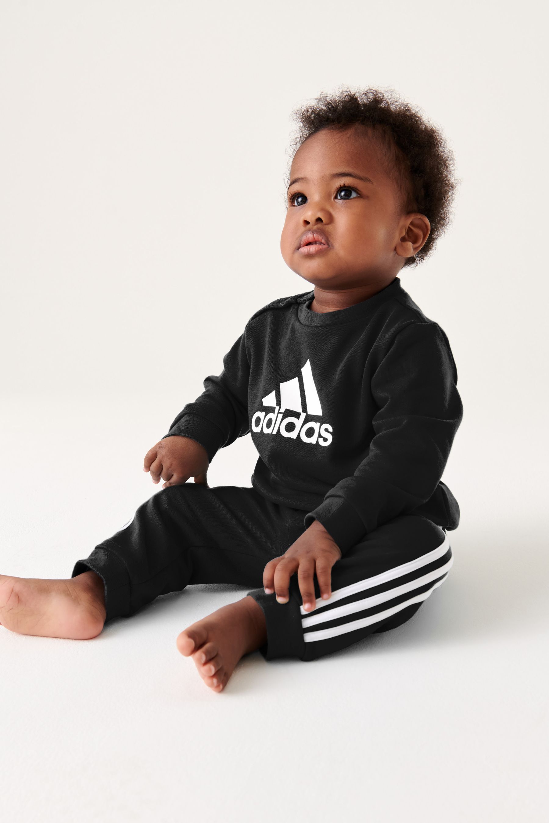 Adidas badge of sport tracksuit store