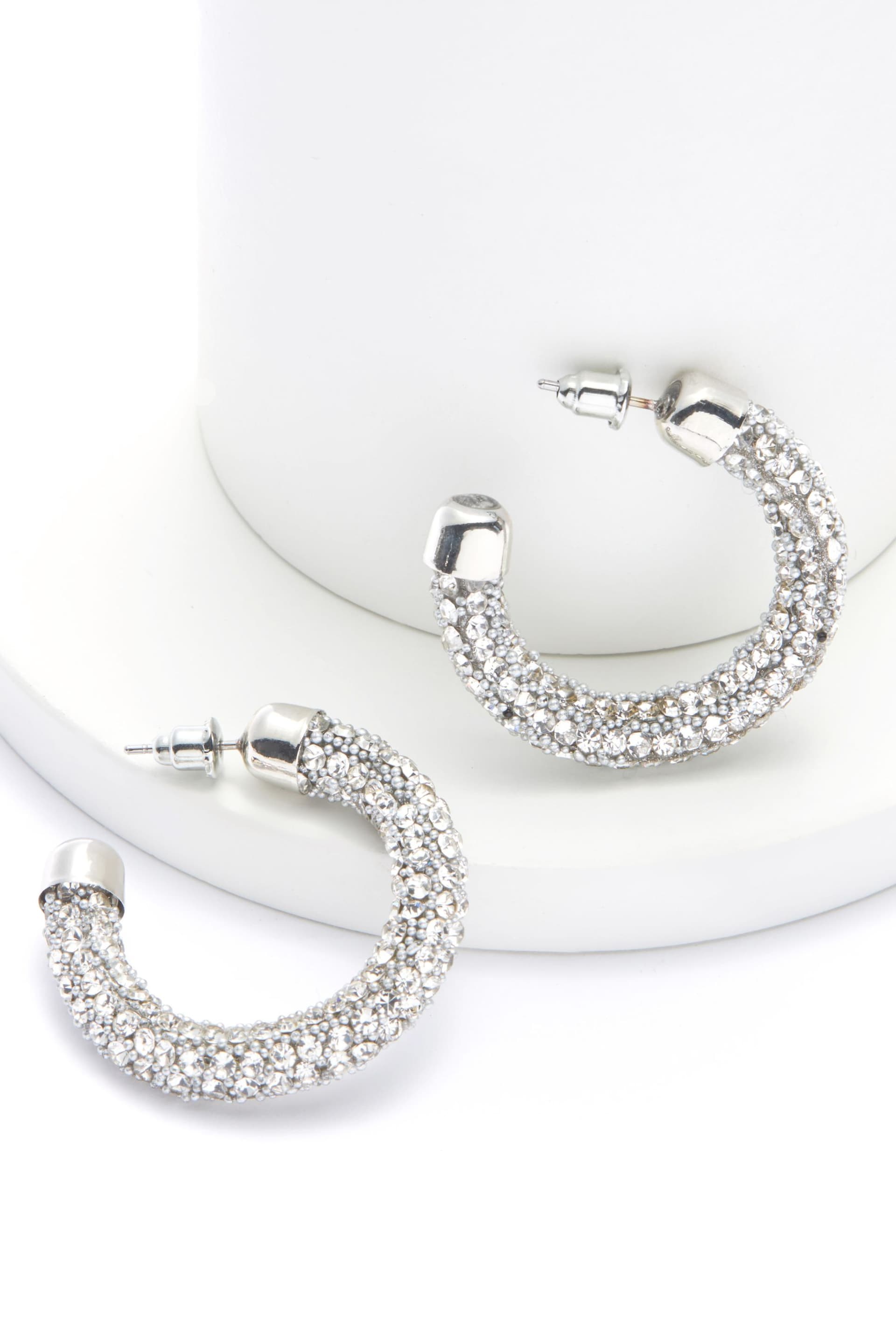 Silver Tone Glitter Hoop Earrings - Image 1 of 2