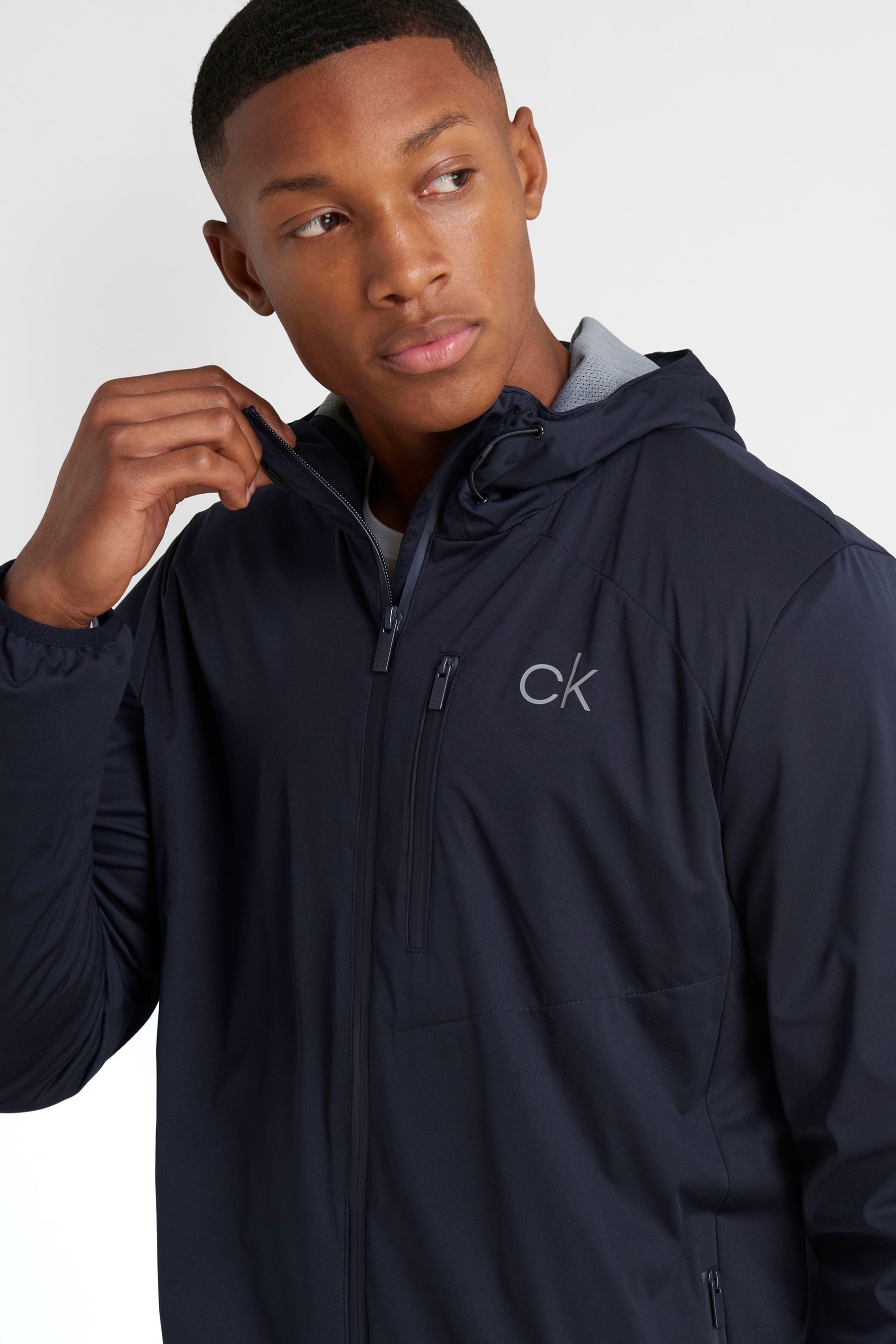 Buy Calvin Klein Golf Blue Ultron Hooded Jacket from Next Ireland