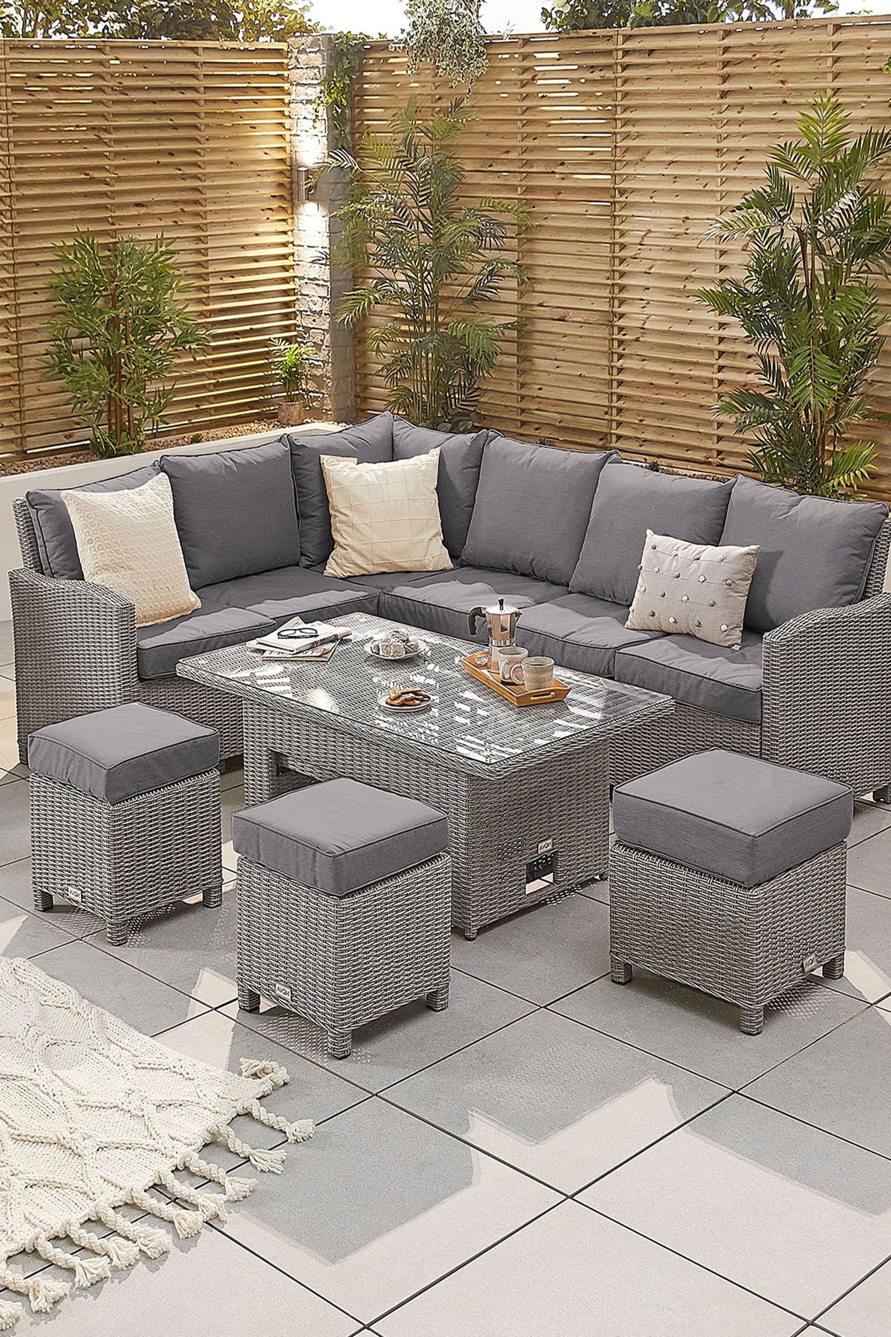 Buy Nova Outdoor Living Grey Ciara Rattan Effect Corner Dining Set with Rising Table from the Next UK online shop