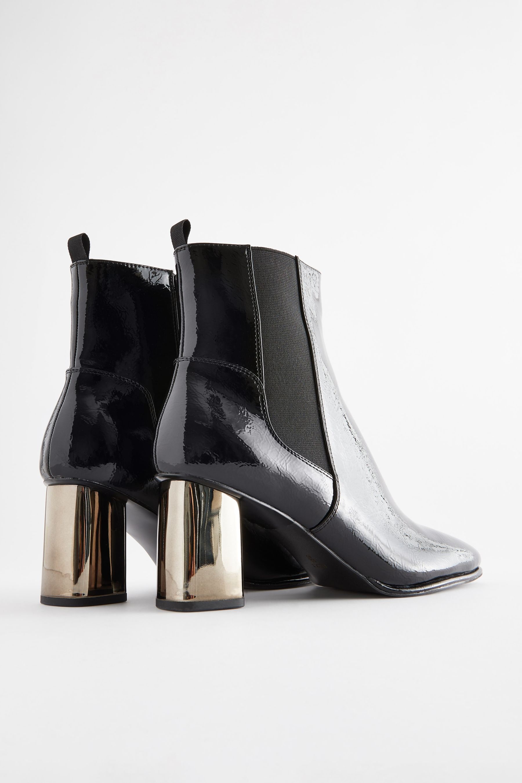 Metal heel ankle boots deals