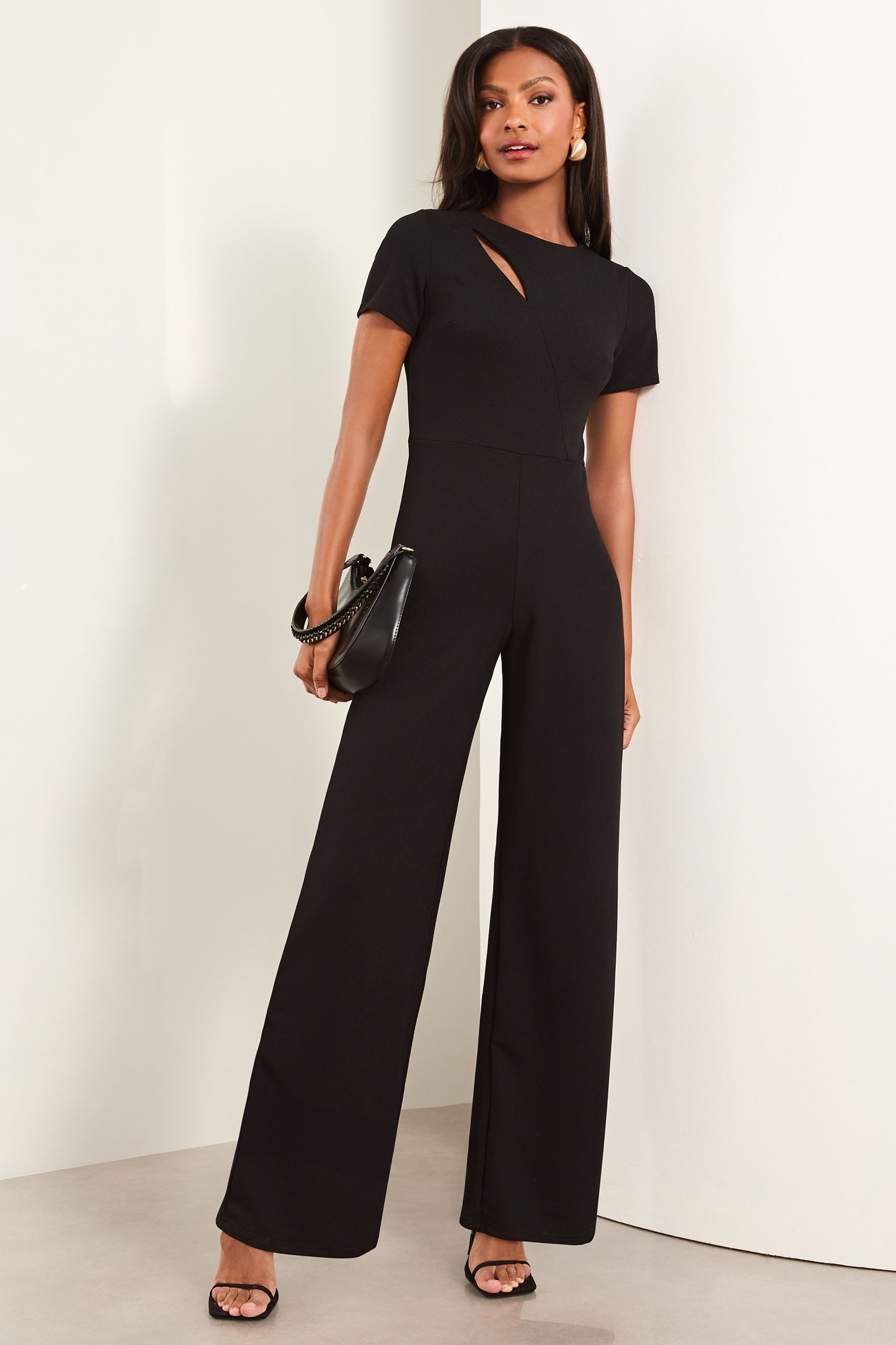 Buy Lipsy Black Petite Splice Detail Short Sleeve Wide Leg Jumpsuit from the Next UK online shop