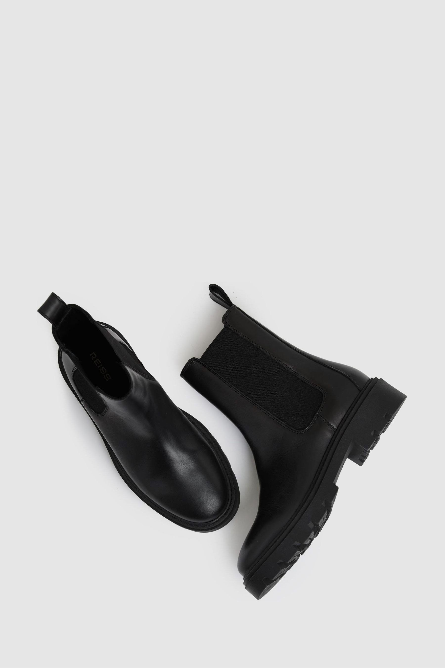Cleated sole chelsea boots top