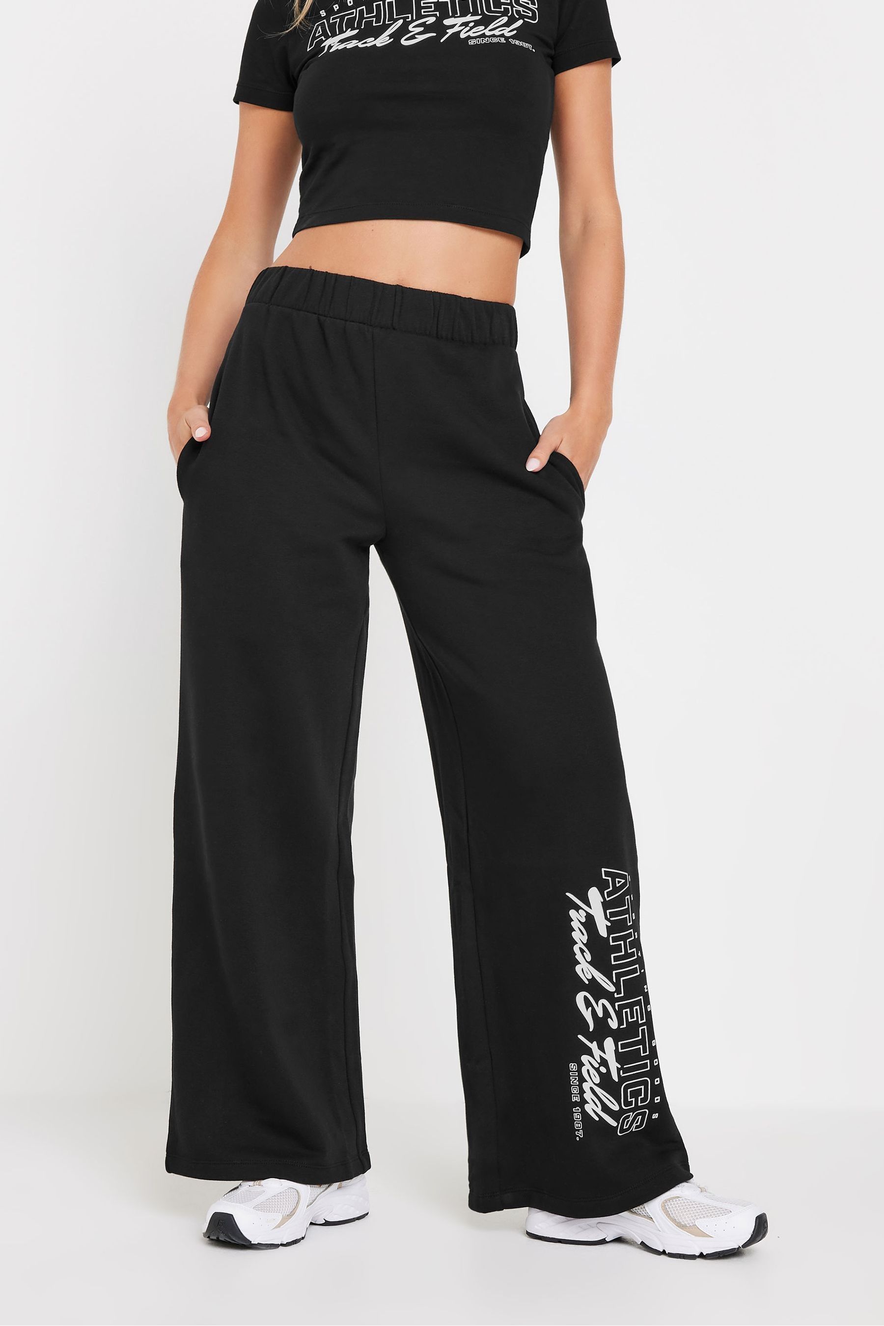 Buy PixieGirl Petite Black Athletics Wide Leg Joggers from the Next UK online shop