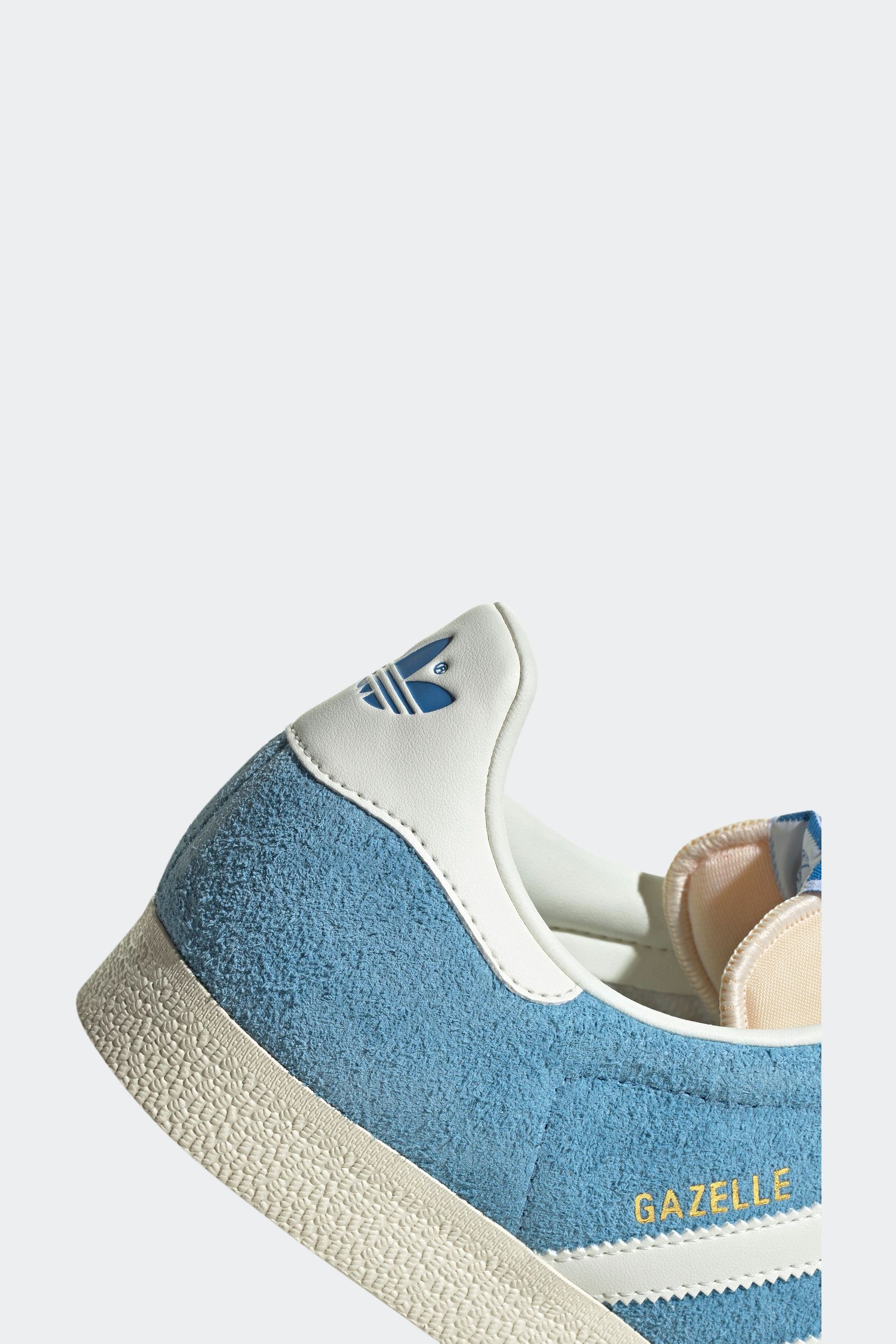 Light blue gazelle trainers discount