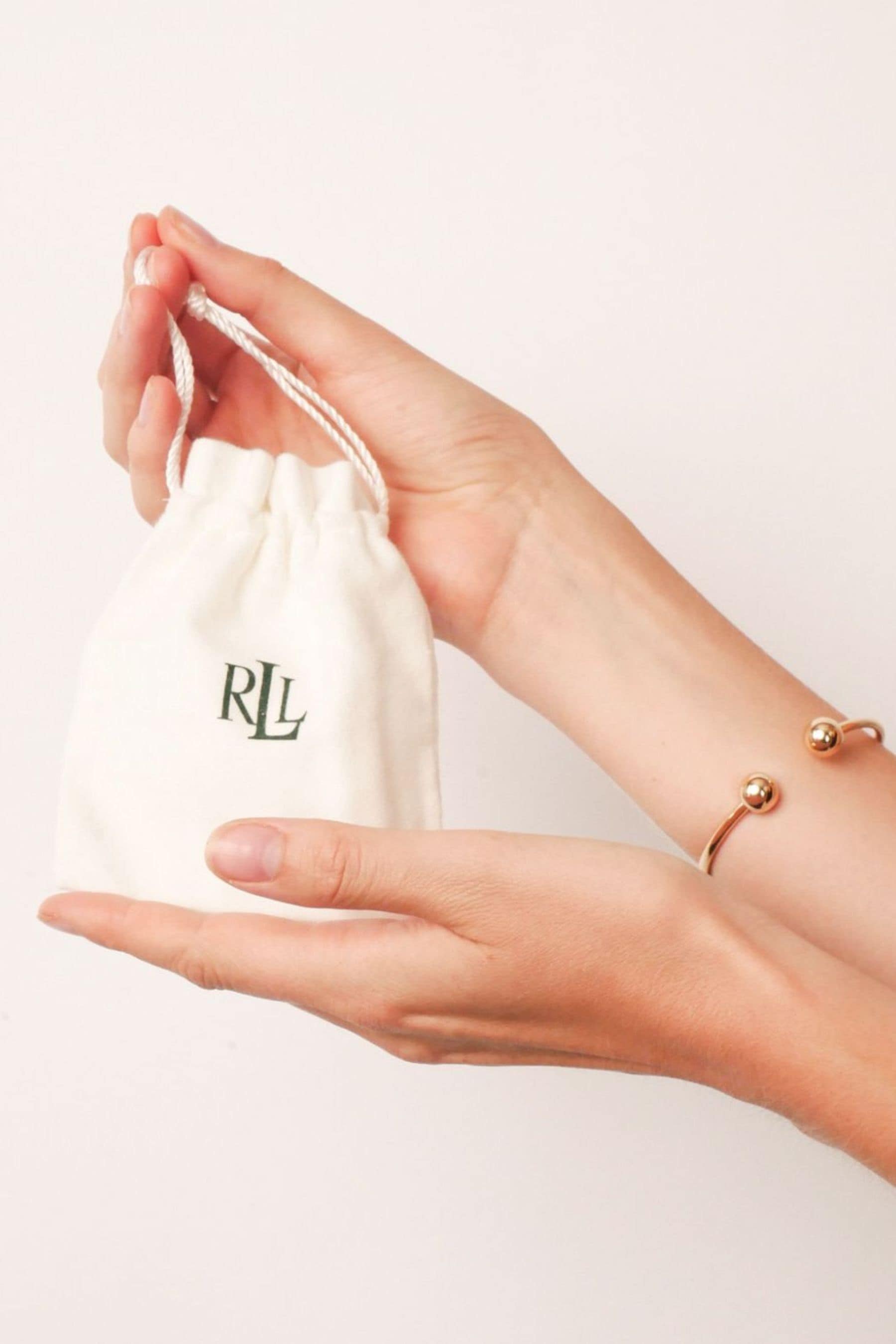 Buy Lauren Ralph Lauren Gold Tone Knot Bypass Bangle Bracelet from Next Luxembourg
