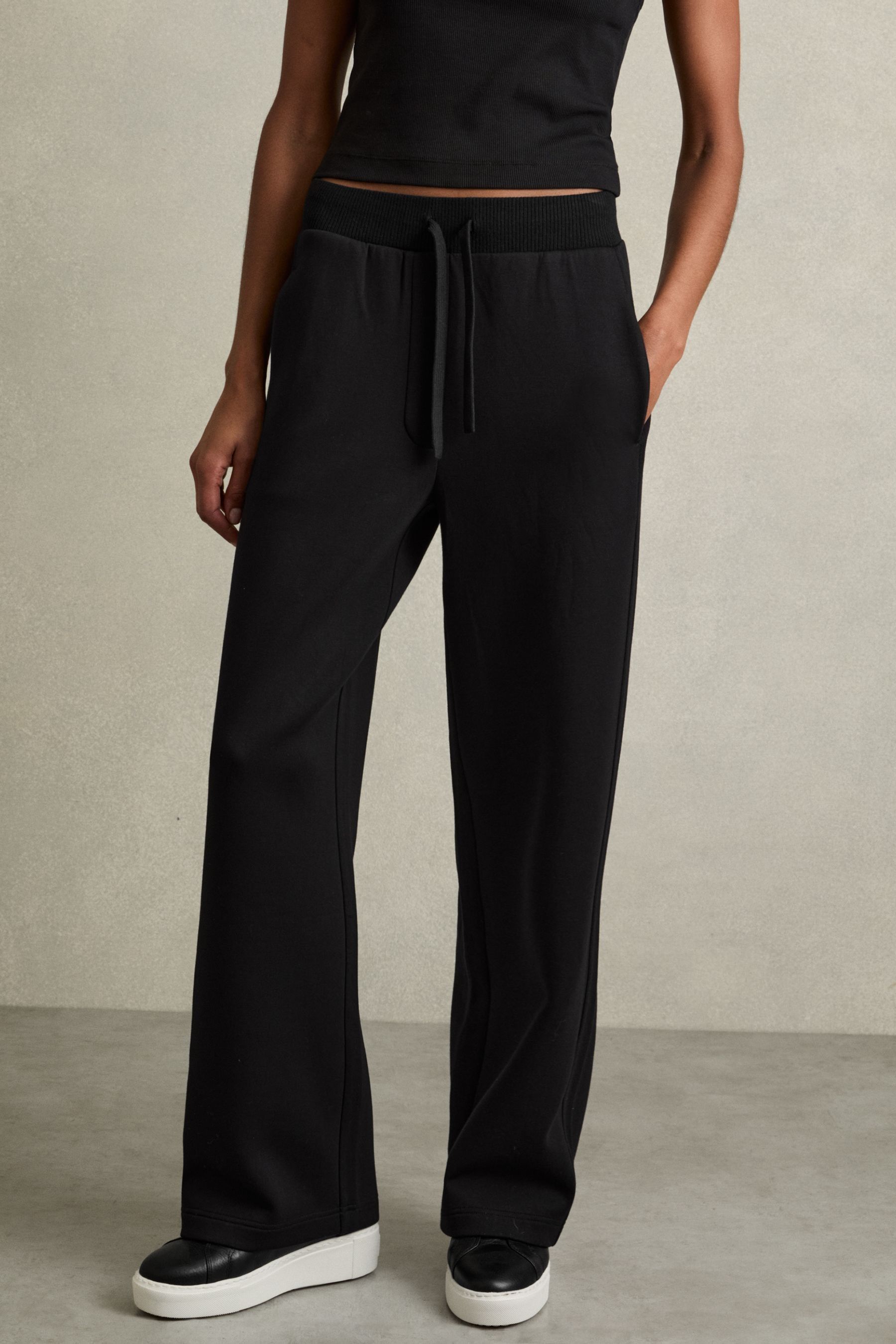 Buy Reiss Black Laney Wide Leg Jersey Drawstring Joggers from the Next UK online shop