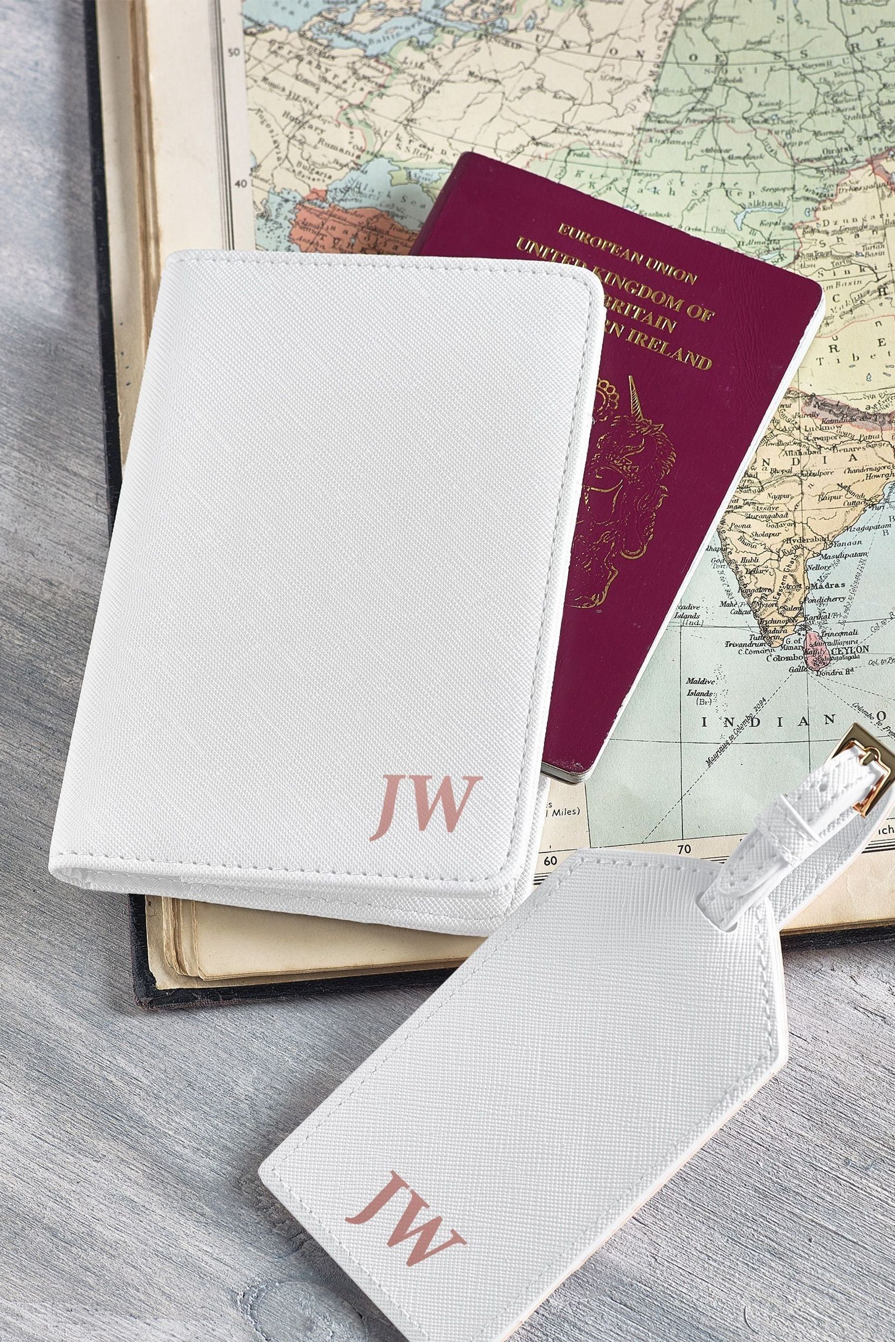 Personalised passport cover and luggage tag store