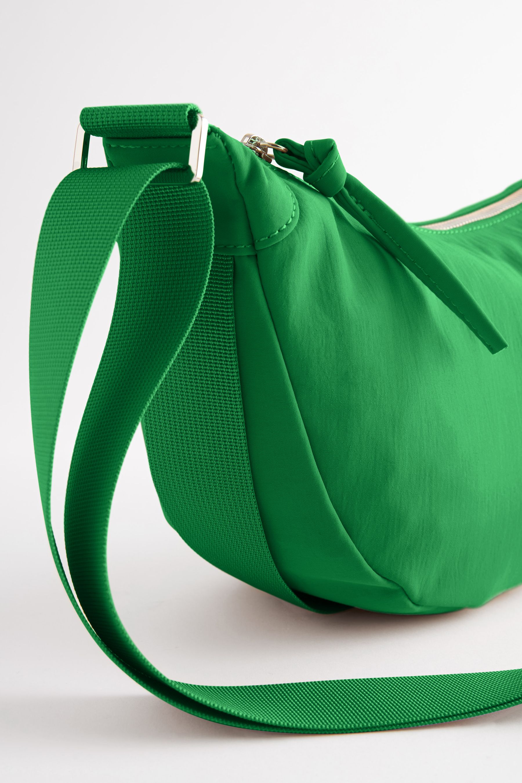 Green sling bags hotsell