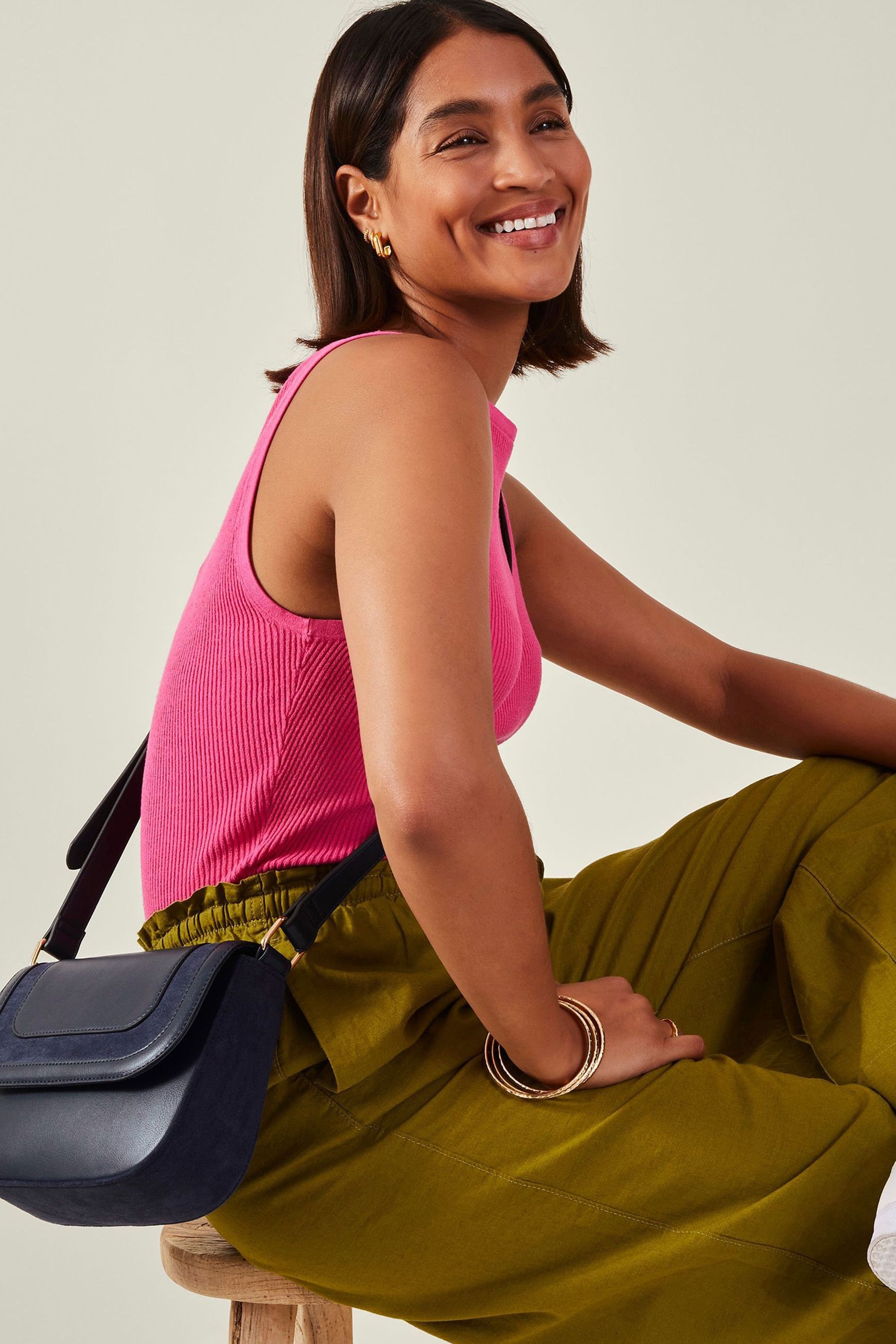 Accessorize cross body bag top