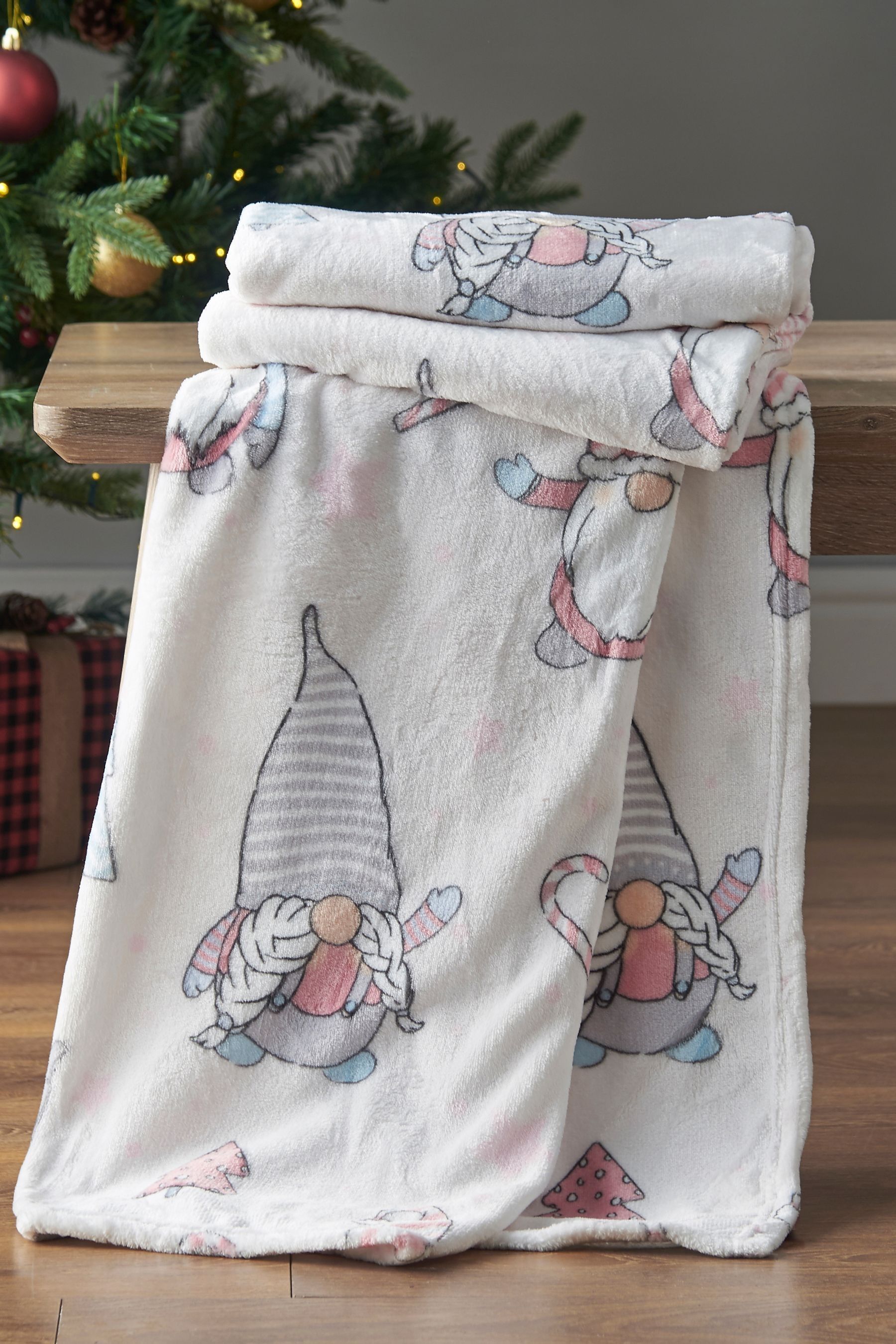 Buy Catherine Lansfield Blush Pink Christmas Gonks Cosy and Warm Fleece Throw from the Next UK online shop