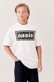 White Oasis Band 100% Cotton T-Shirt (3-16yrs) - Image 1 of 6