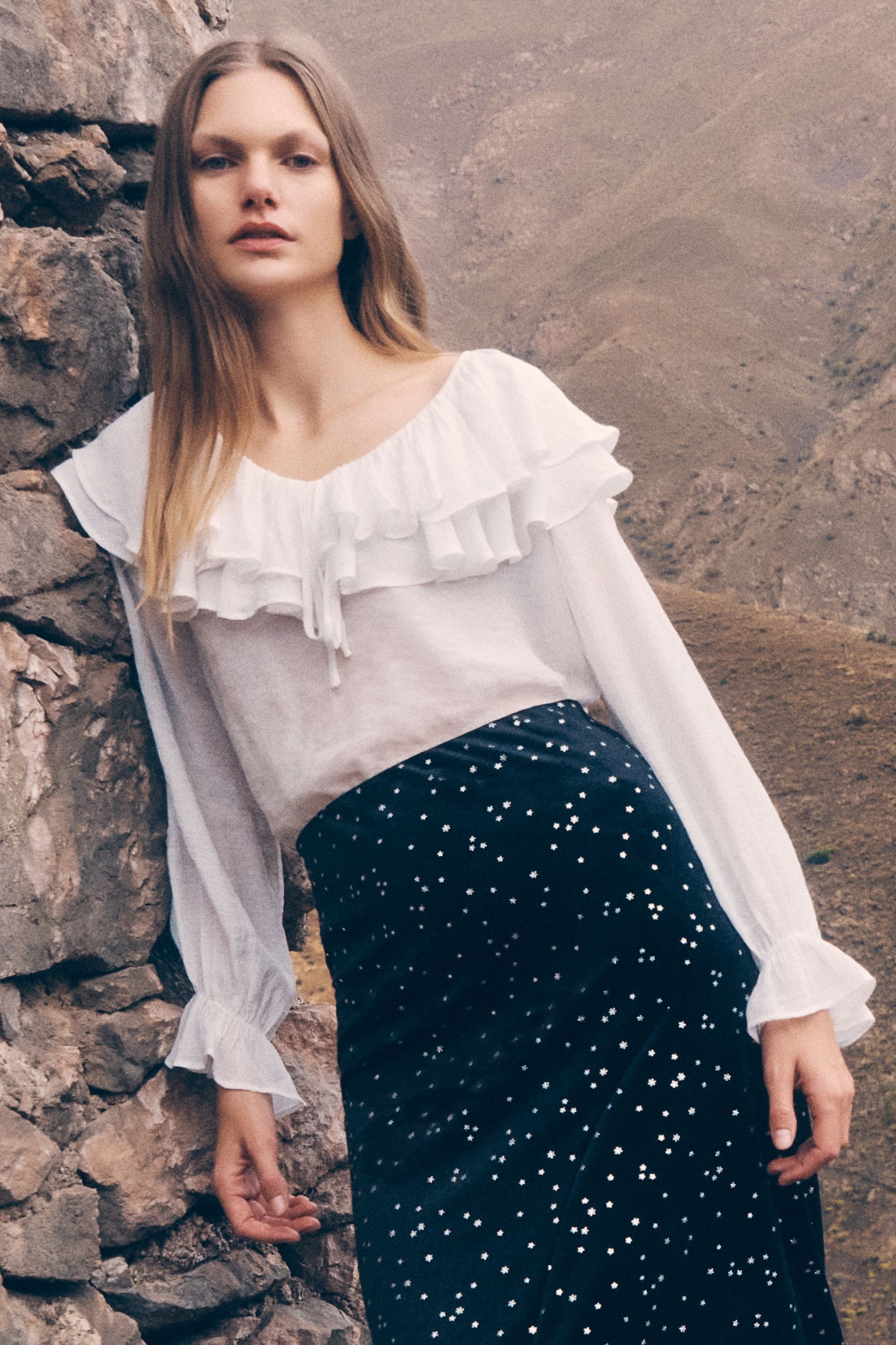 White ruffle collar blouse top