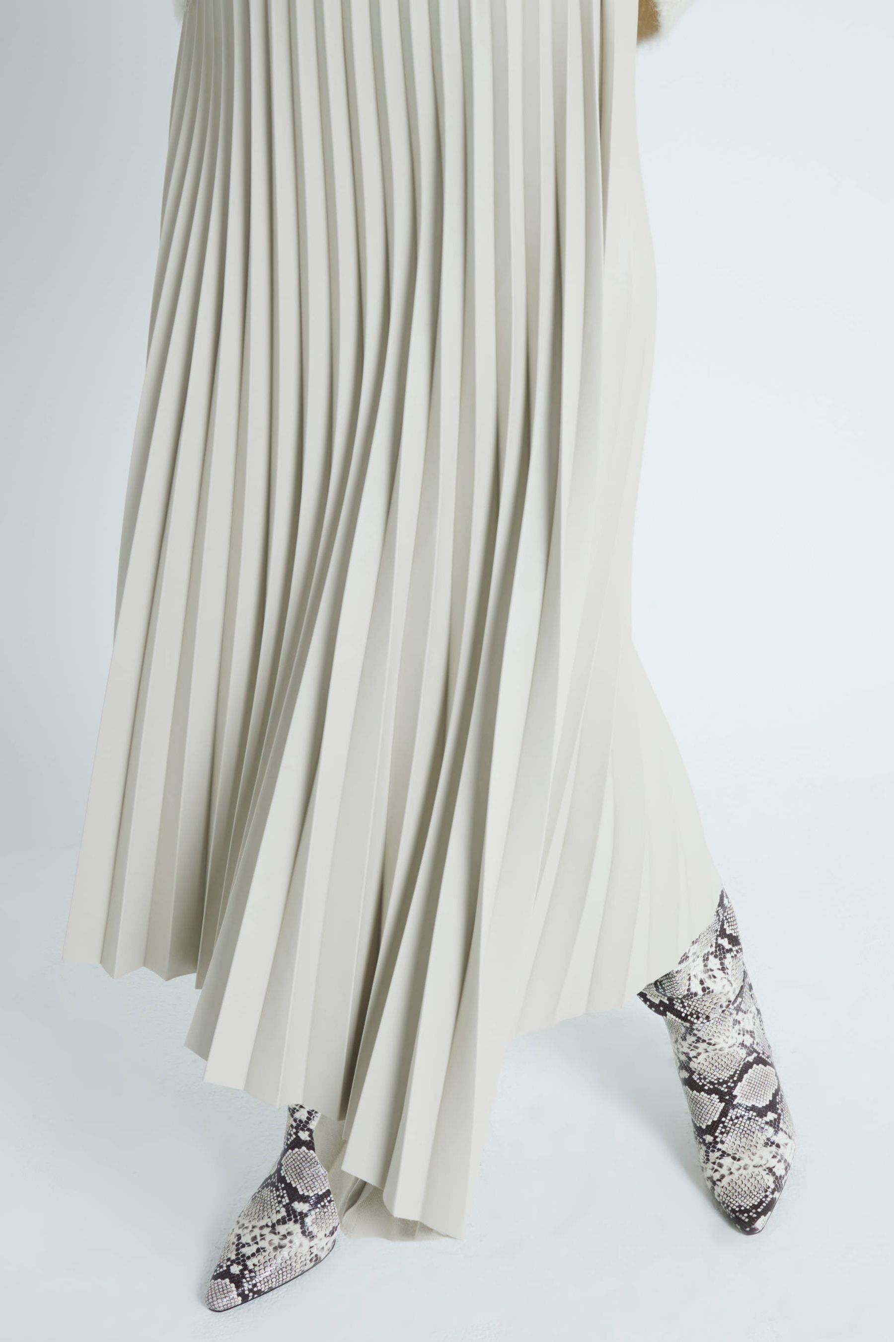 Buy River Island Cream Faux Leather Pleated Midi Skirt from the Next UK online shop