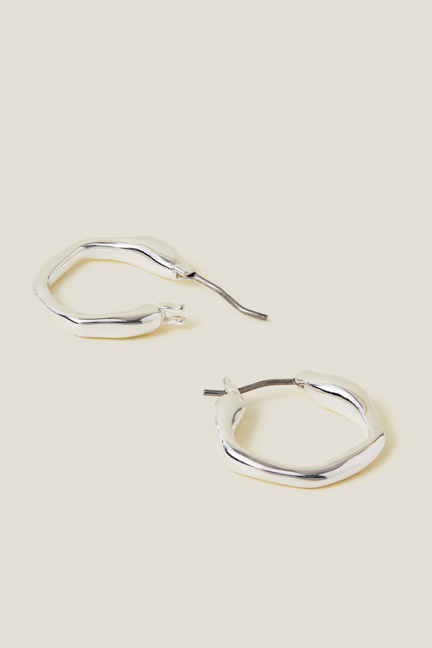 Buy Accessorize Silver Tone Small Molten Hoop Earrings from Next Gibraltar