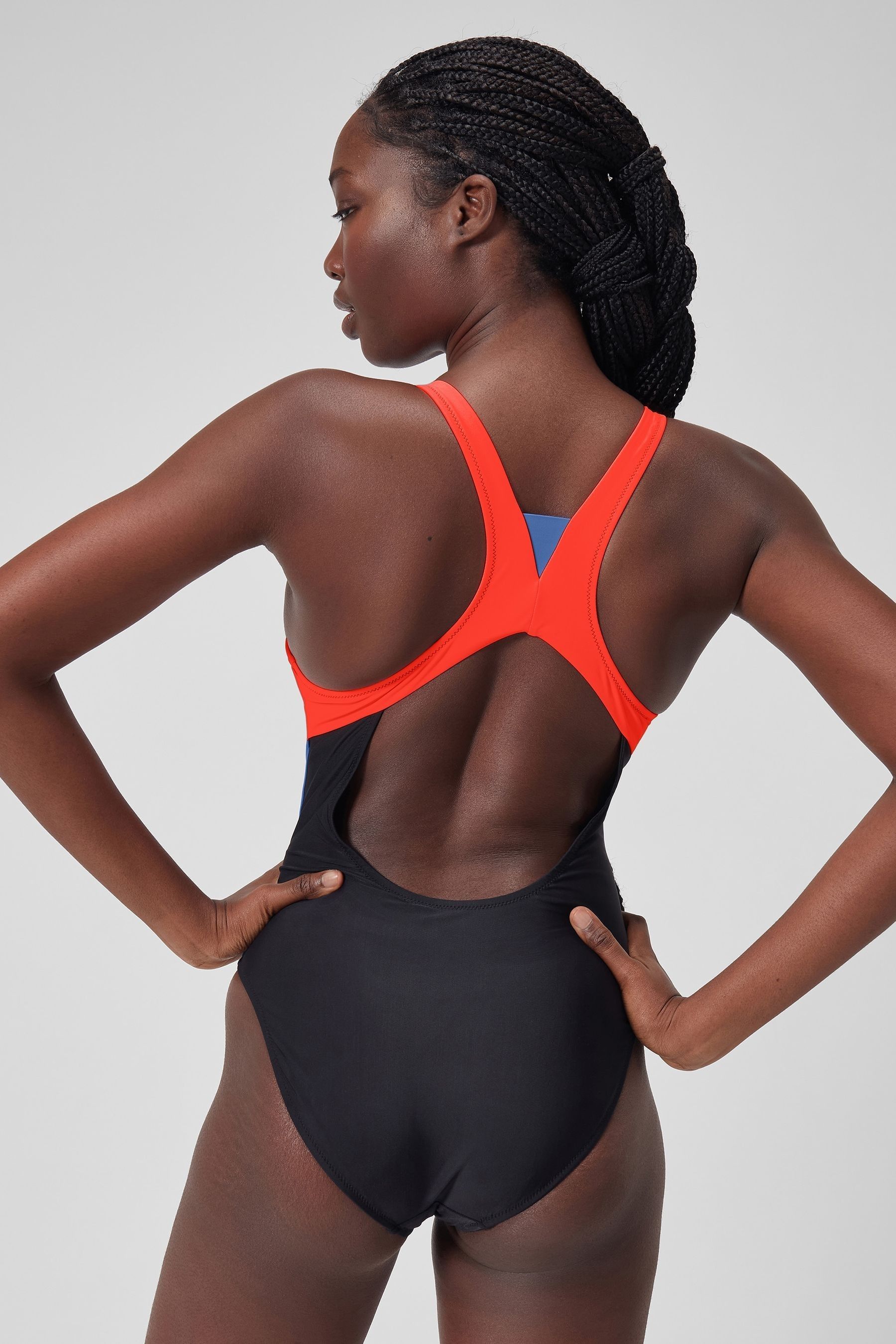 Zip up red swimsuit top