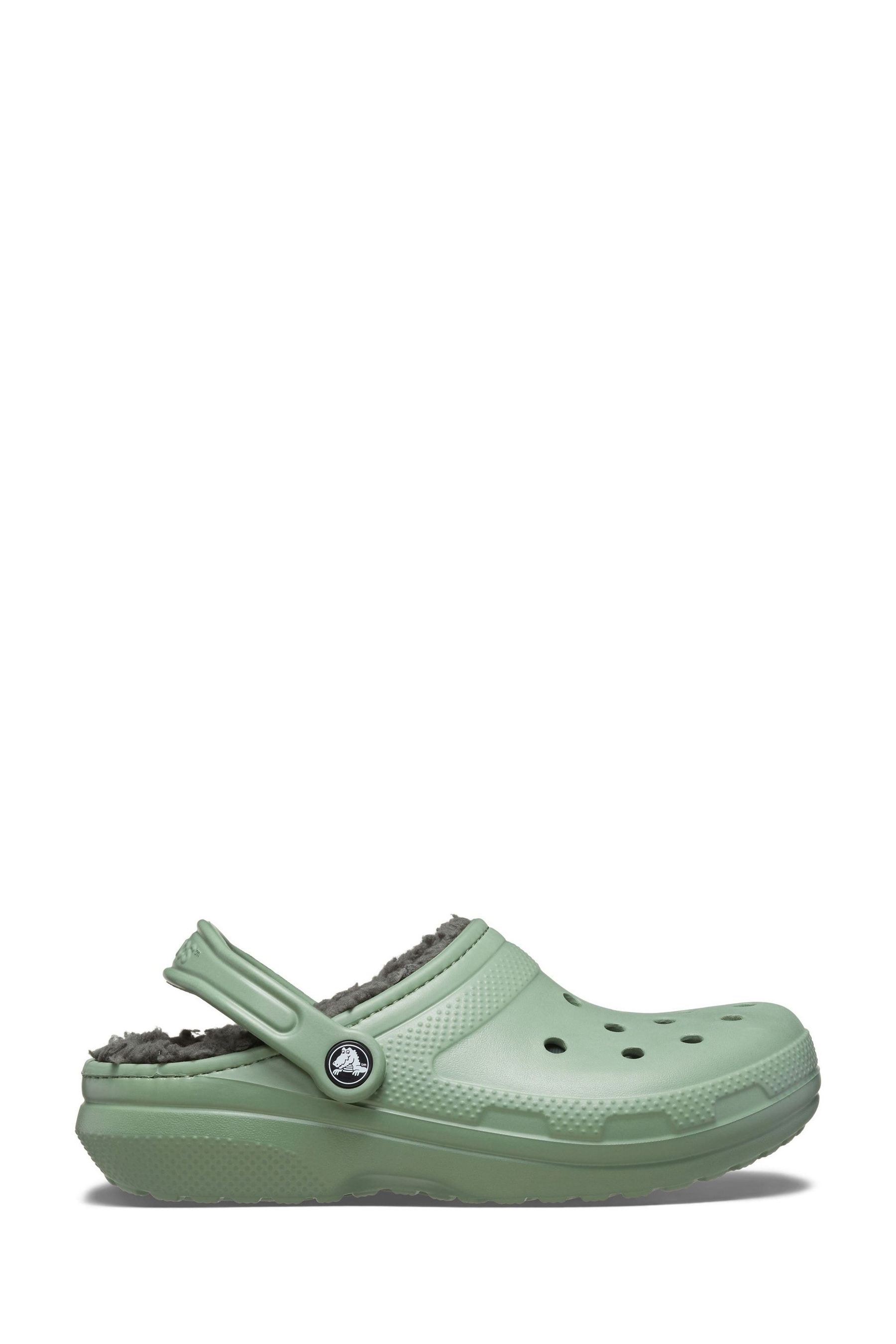 Green fuzzy crocs deals