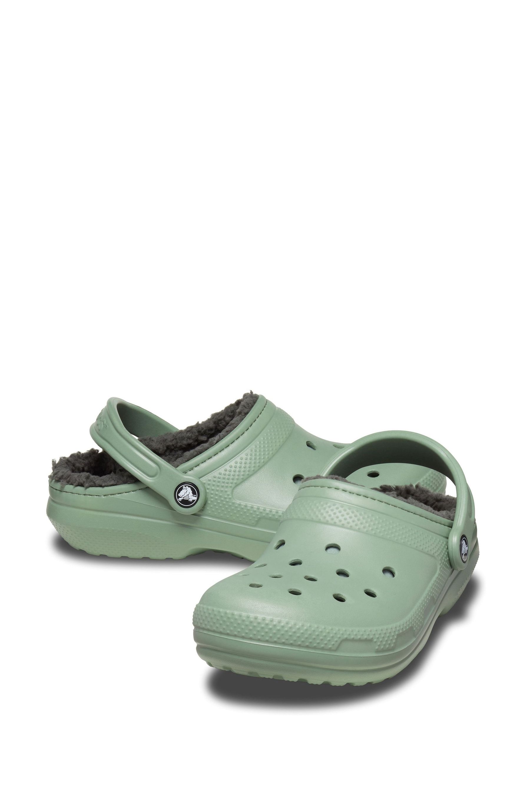 Green fuzzy crocs clearance