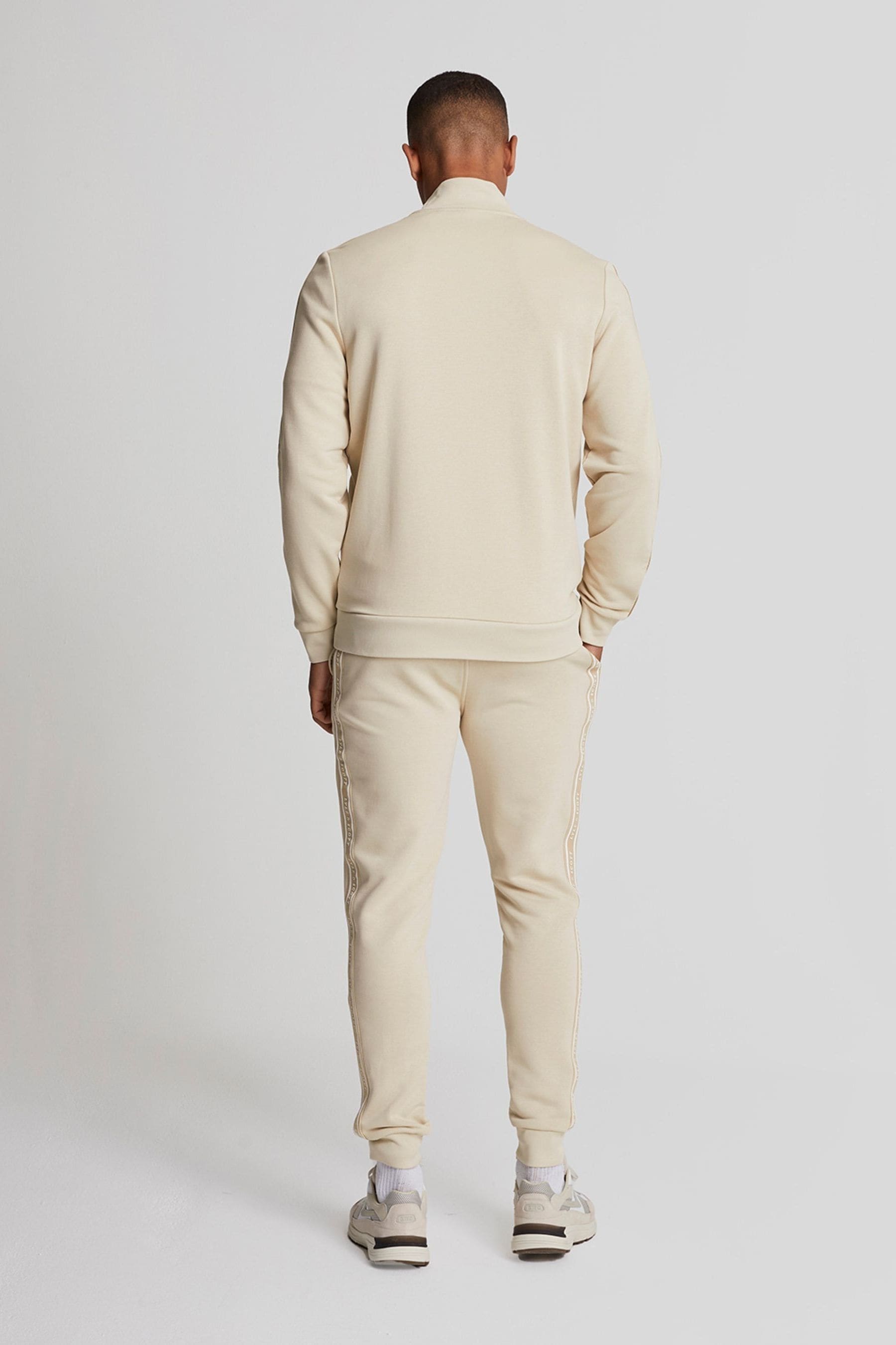 Cream tracksuit bottoms online