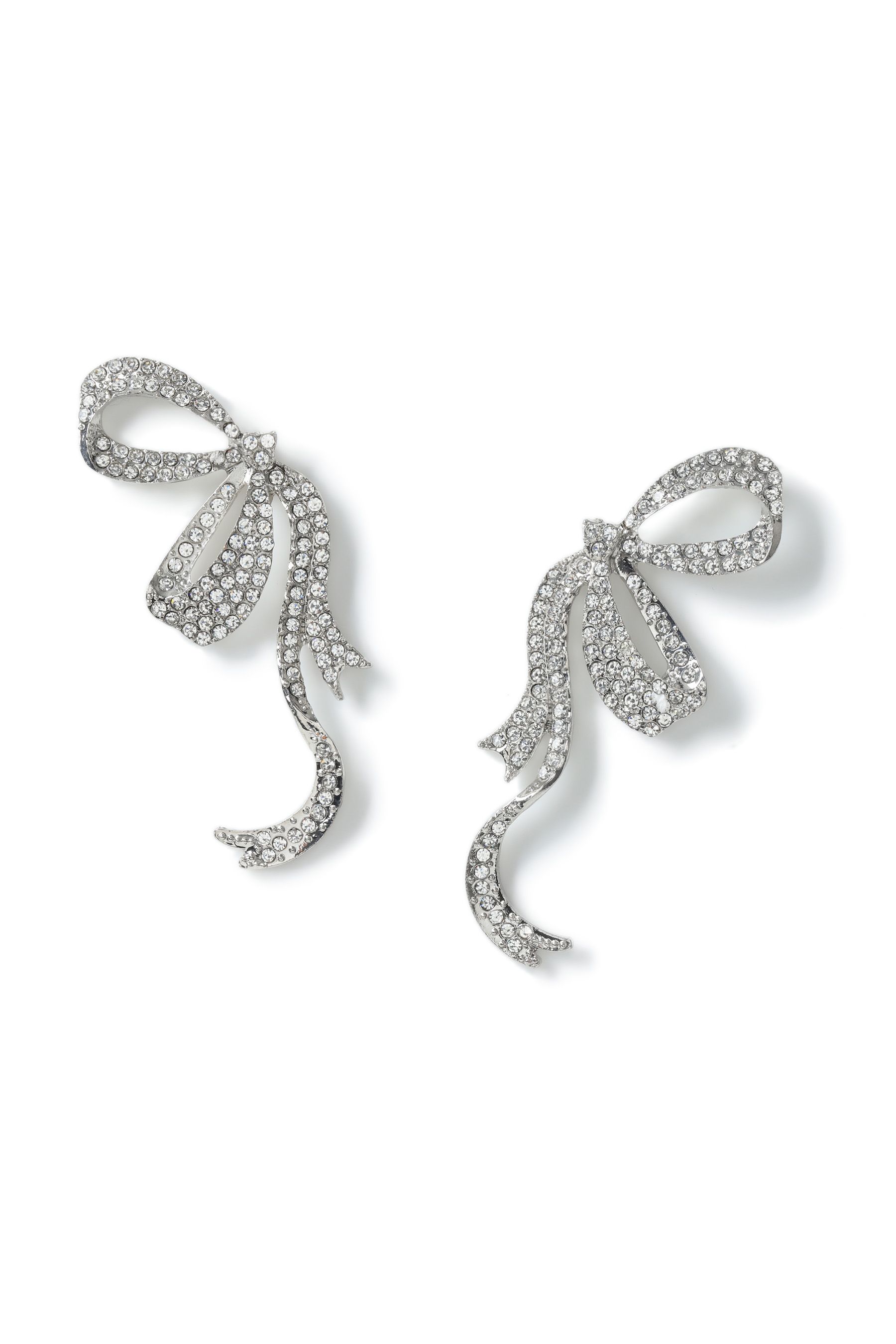 Buy Aela Oversized Silver Tone Rhinestone Bow Stud Earrings from the Next UK online shop