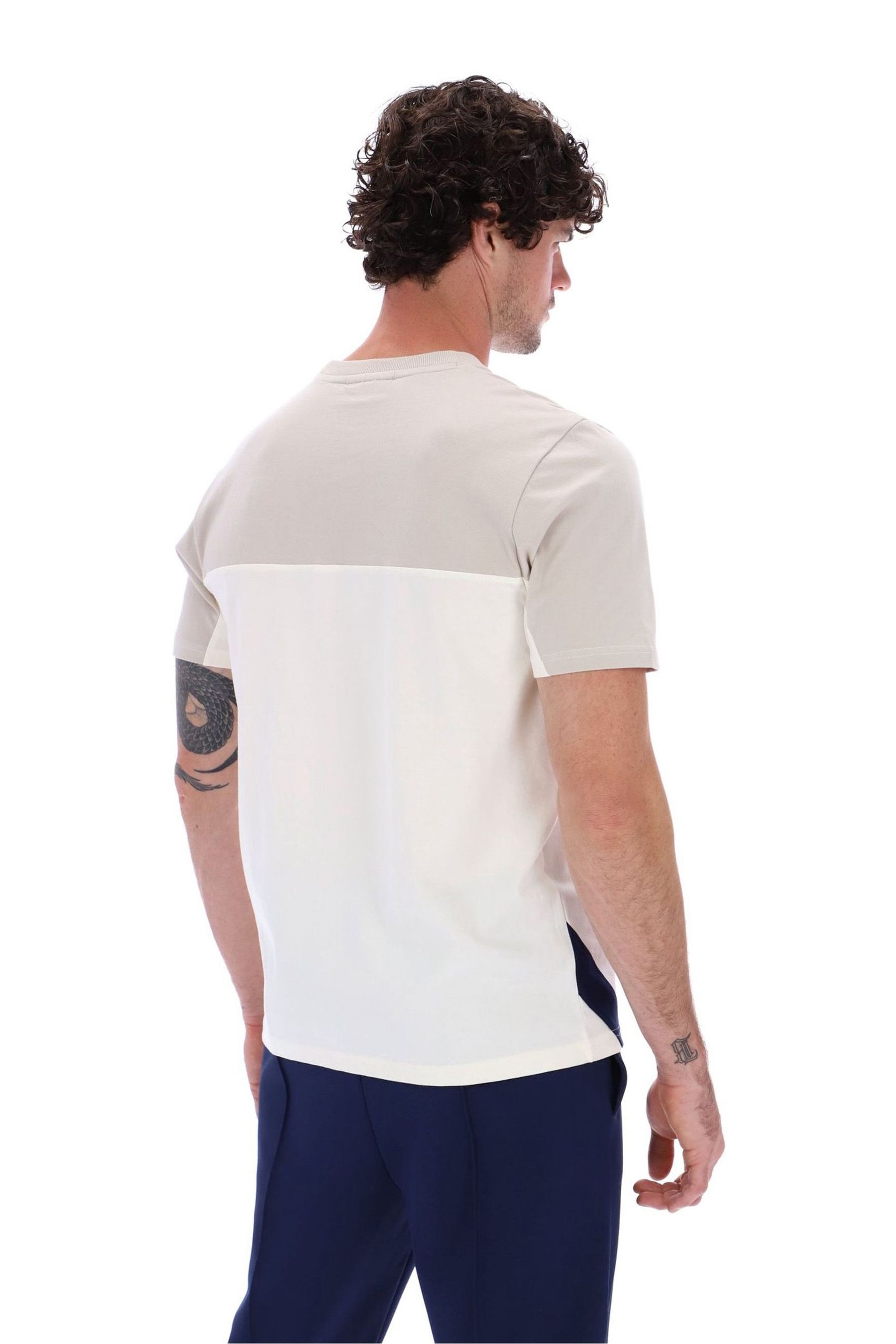 Cream fila shirt store
