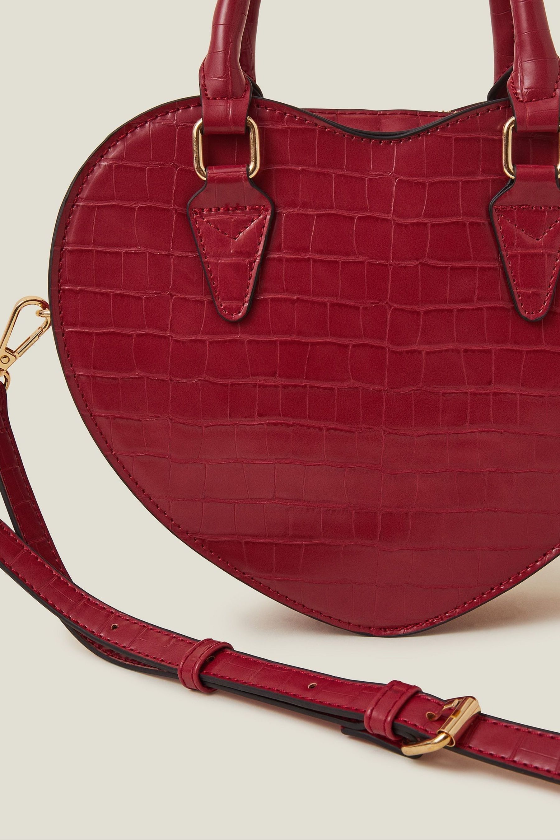 Buy Accessorize Red Faux Leather Heart Crossbody Bag from the Next UK online shop