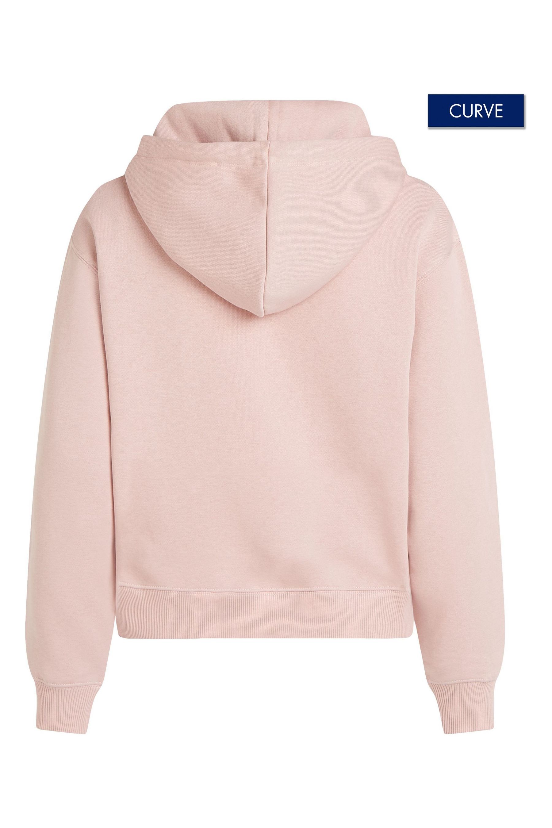 Buy Tommy Hilfiger Pink Regular Fit Curve Modern Logo Hoodie from the Next UK online shop