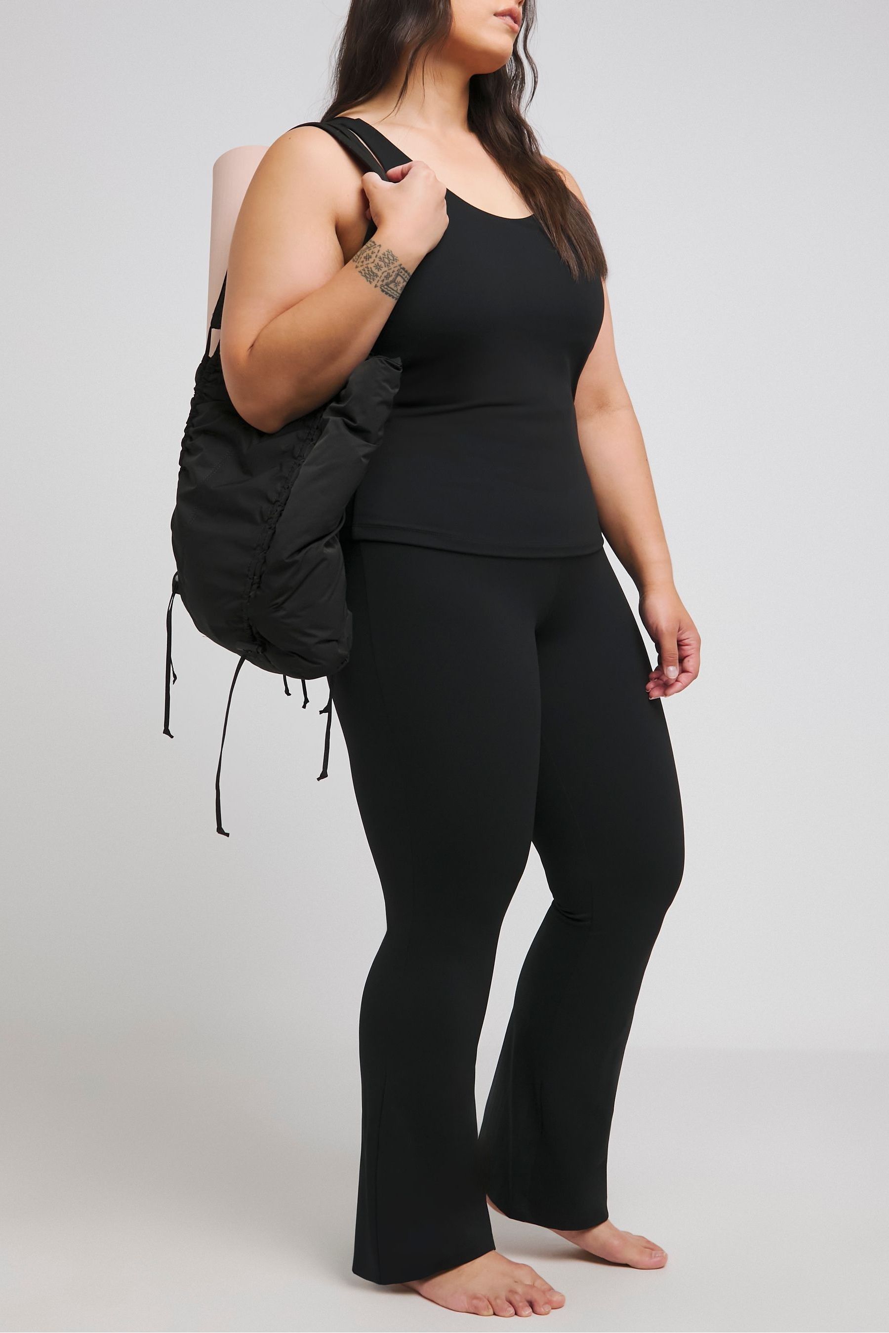 Buy Simply Be Black Magisculpt 360 Control Full Flared Yoga Pants from the Next UK online shop