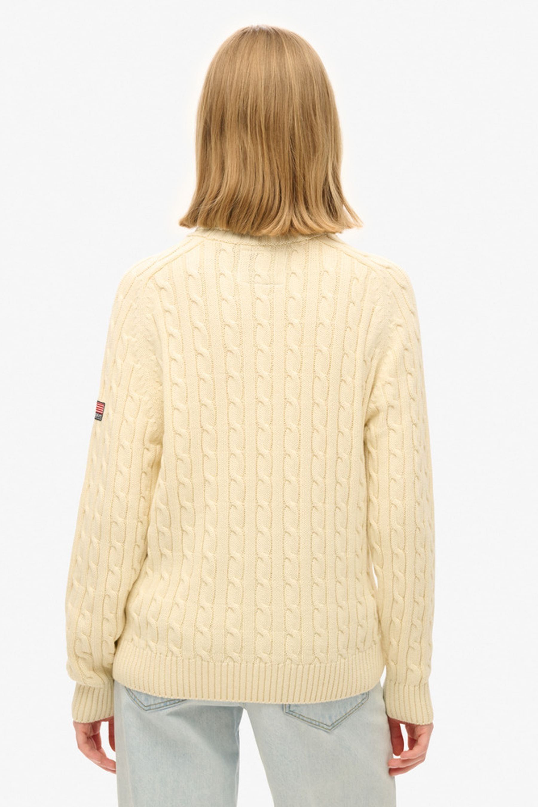 Buy Superdry White Slouchy Cable Roll Neck Jumper from Next Luxembourg