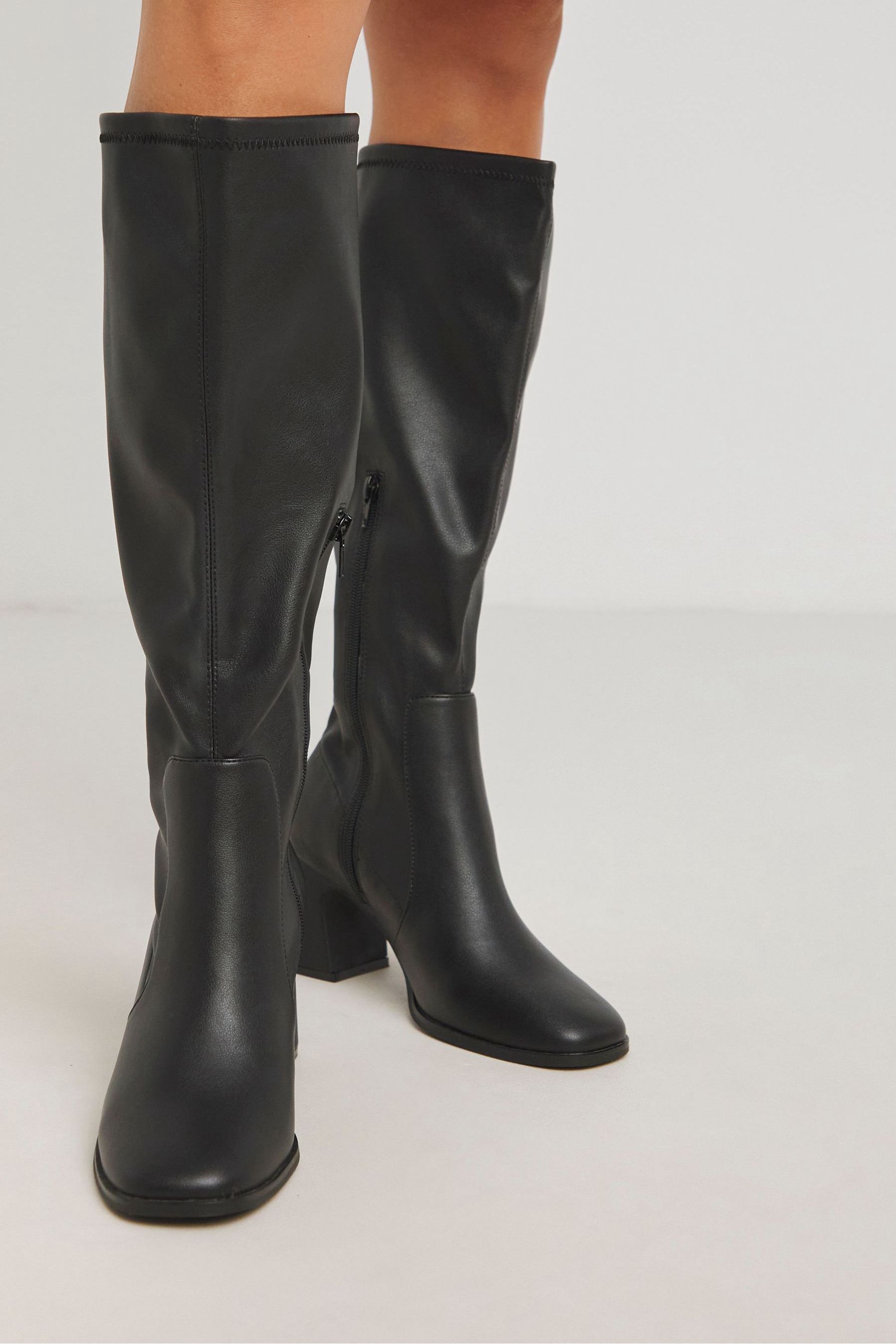 Buy Simply Be Black Wide Fit Classic Heeled Knee High Stretch Boots With Curvy Calf from Next Canada