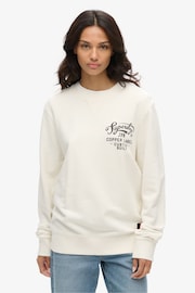 Superdry Cream Oversized Copper Label 100% Cotton Graphic Crew Sweatshirt - Image 1 of 3