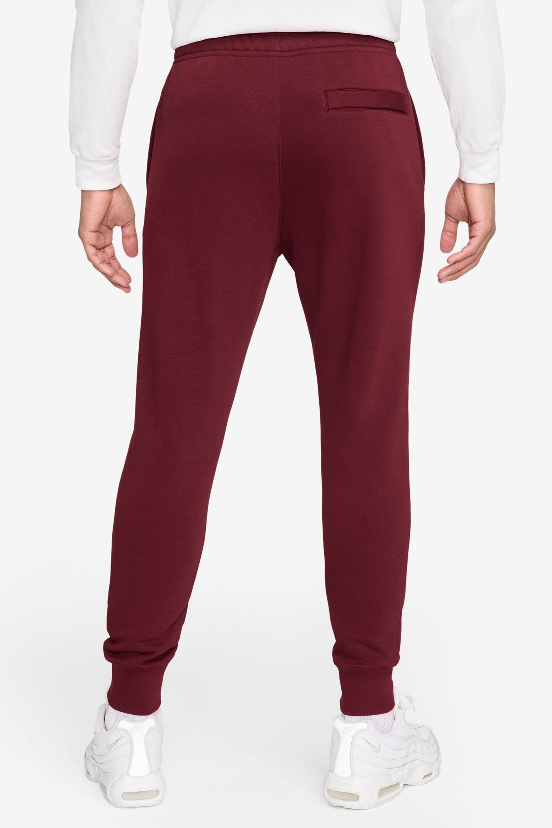 Buy Nike Team Red White Club Joggers from Next Poland