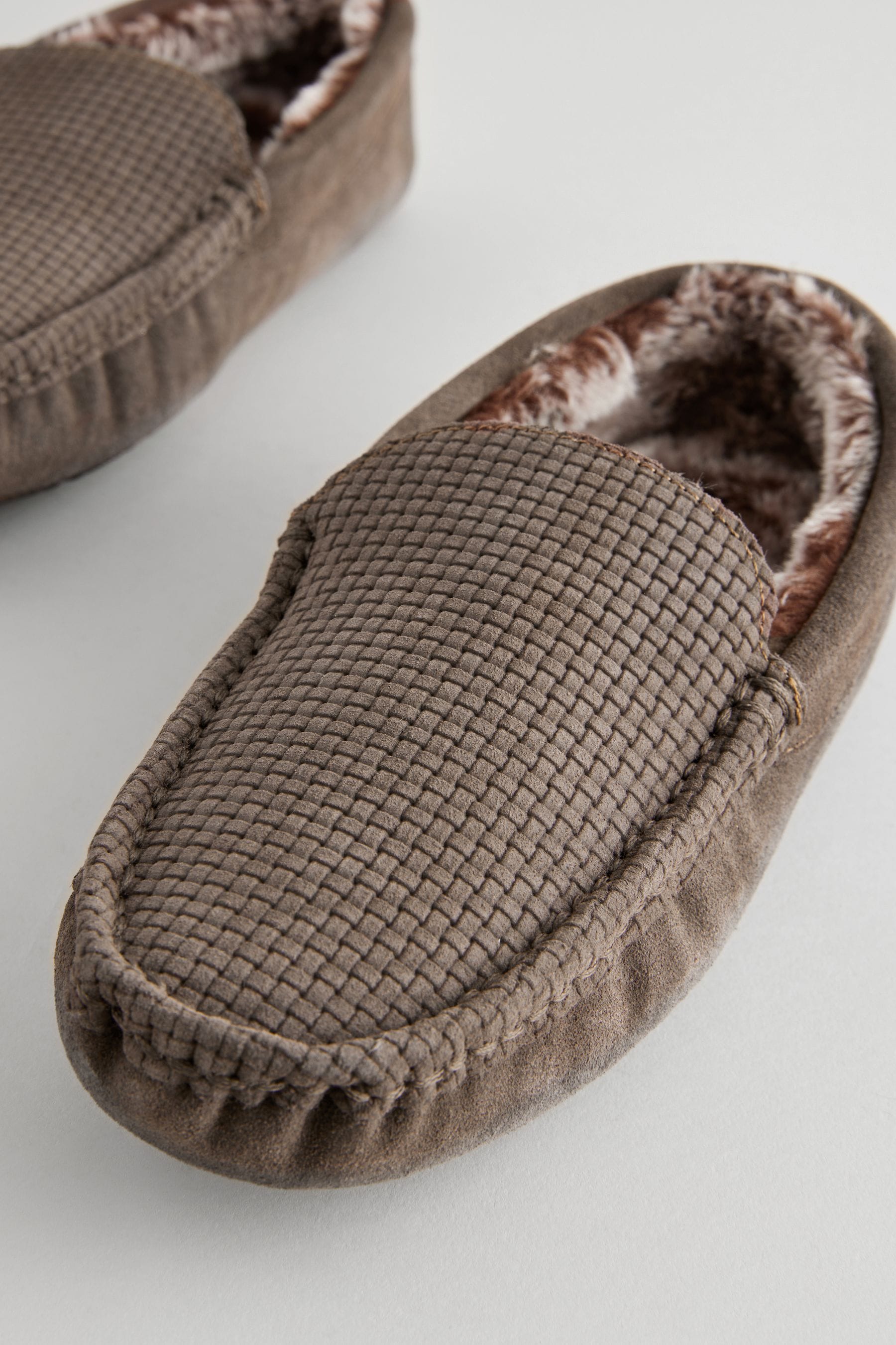 Furry moccasins top