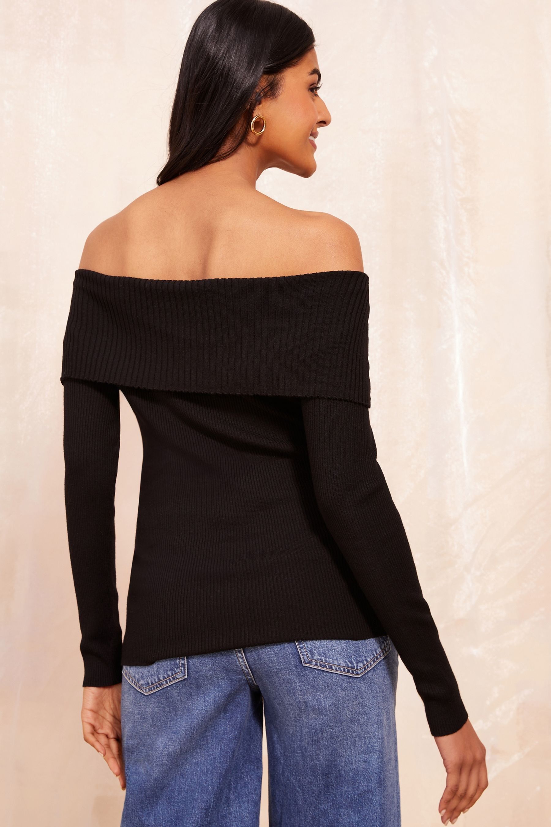 Black friends jumper clearance