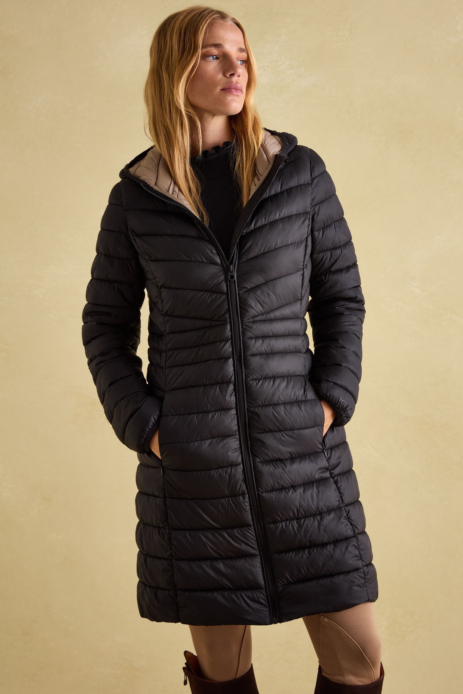 Long padded coat with fur hood on sale