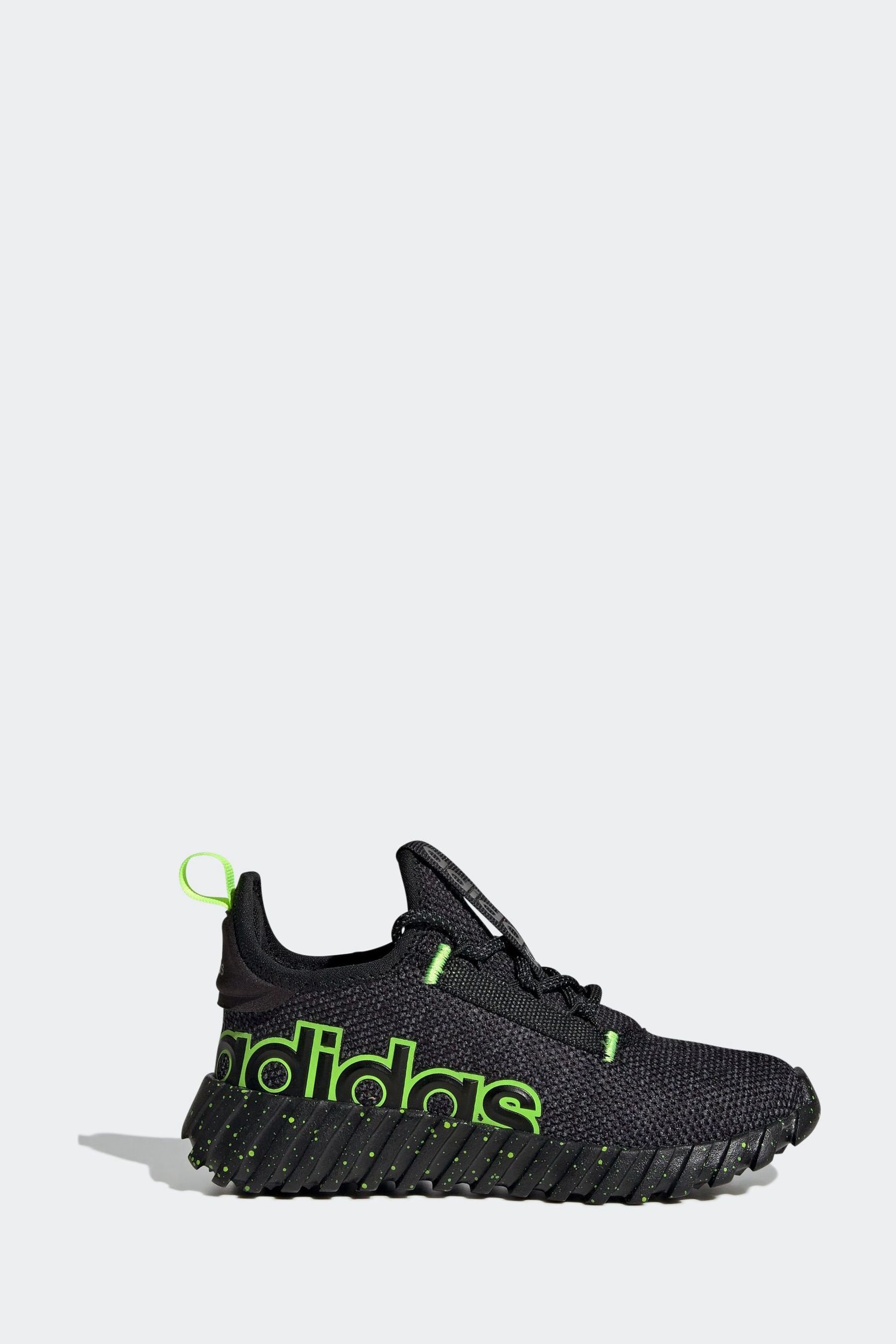 Adidas black and lime green shoes top