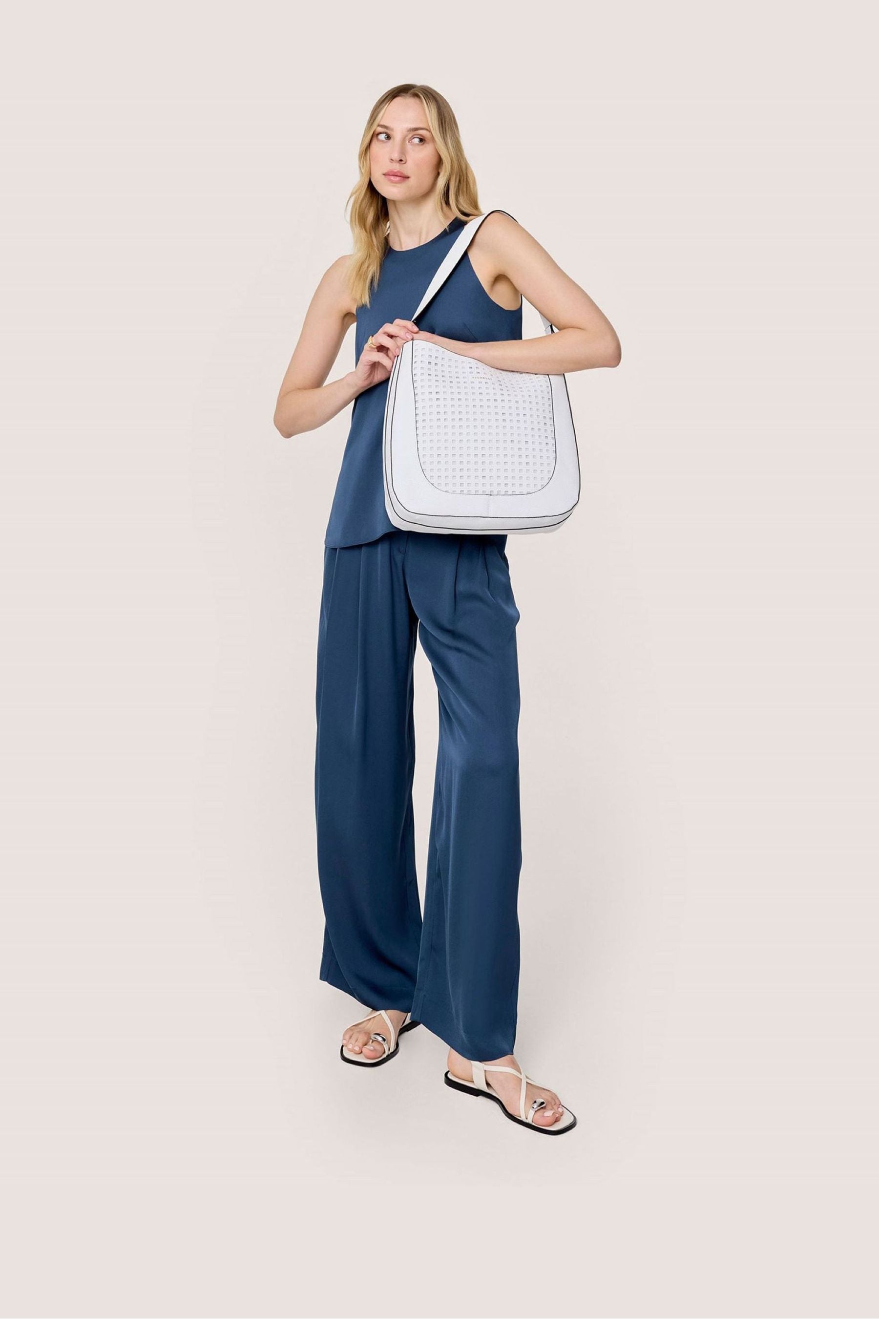 Buy Fiorelli Alma Hobo Cut Out White Bag from the Next UK online shop