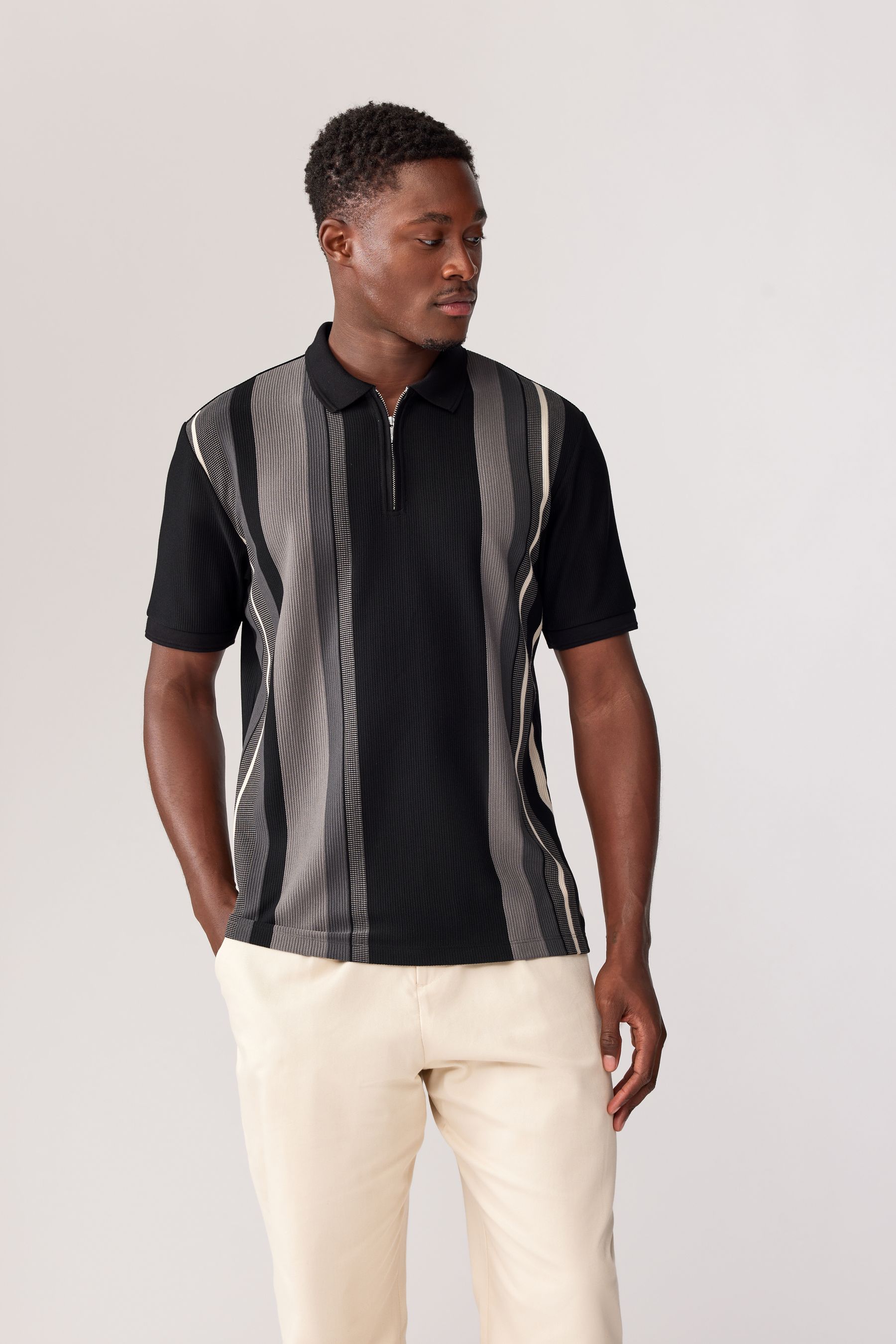 Buy Black White Vertical Stripe Quarter Zip Polo Shirt from the Next UK online shop