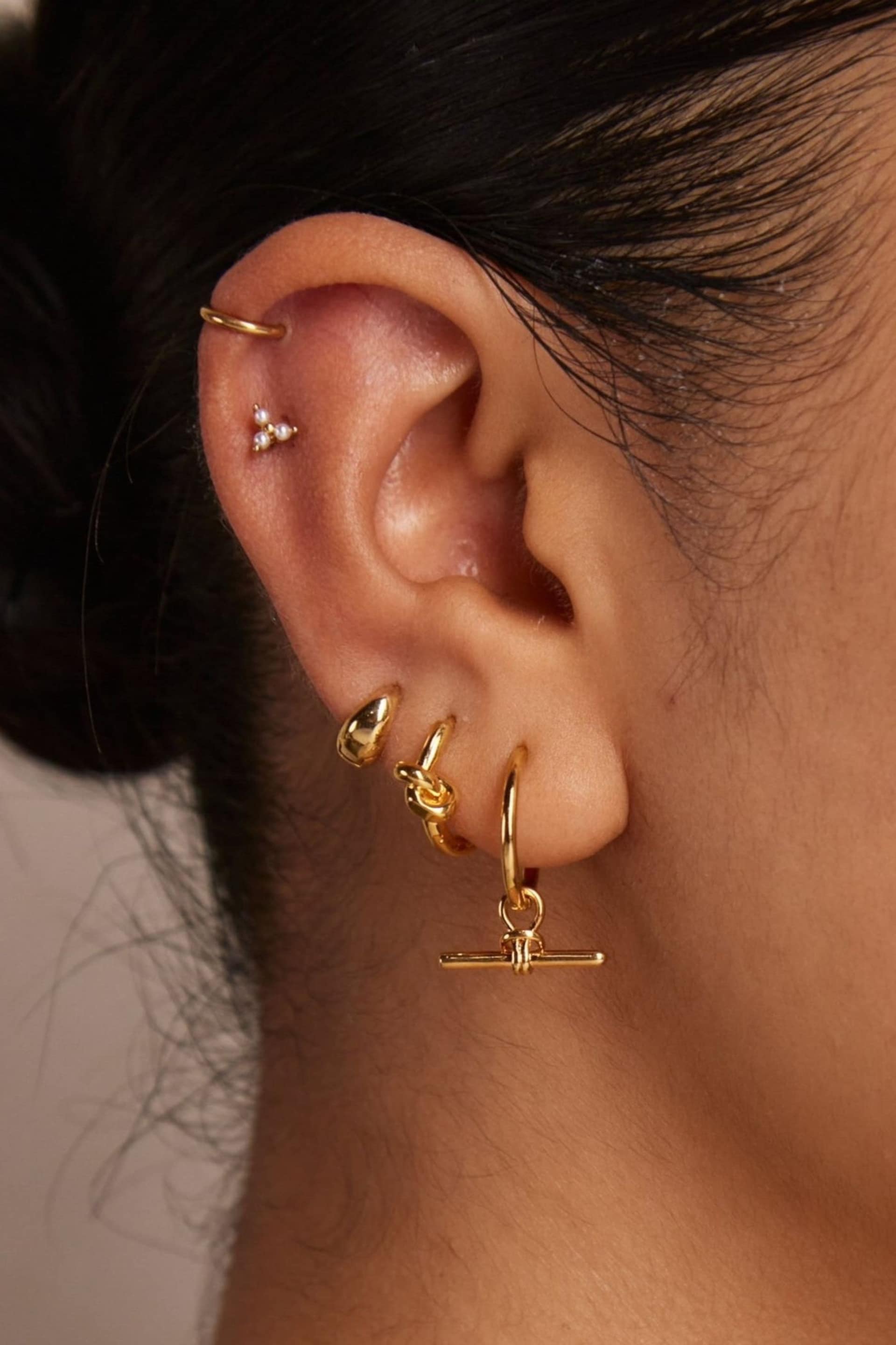 Orelia London 18k Gold Plating Polished Knot Huggie Hoops Earrings - Image 2 of 2