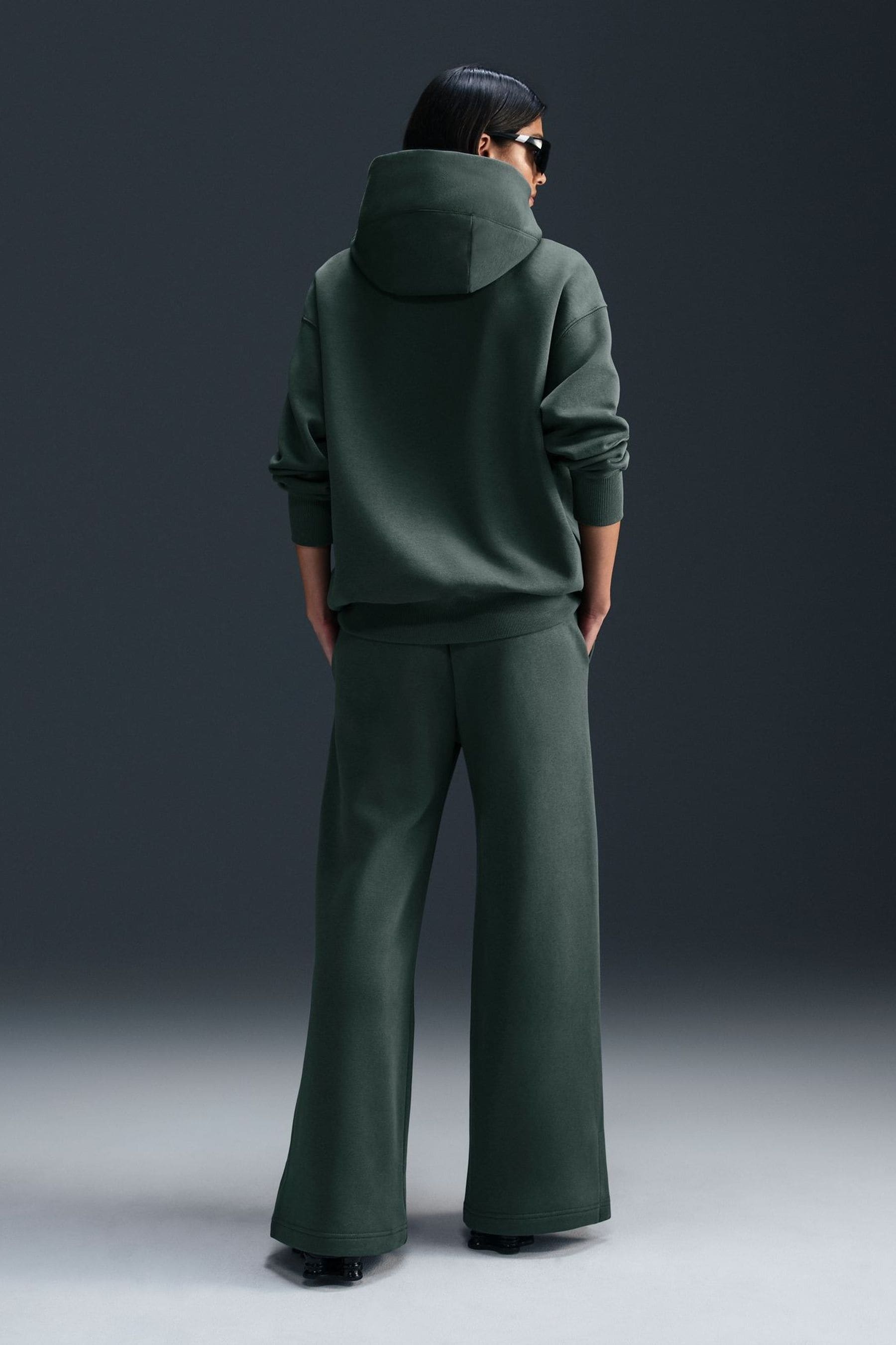 Buy Nike Dark Green Phoenix Fleece High Waisted Wide Leg Joggers from the Next UK online shop