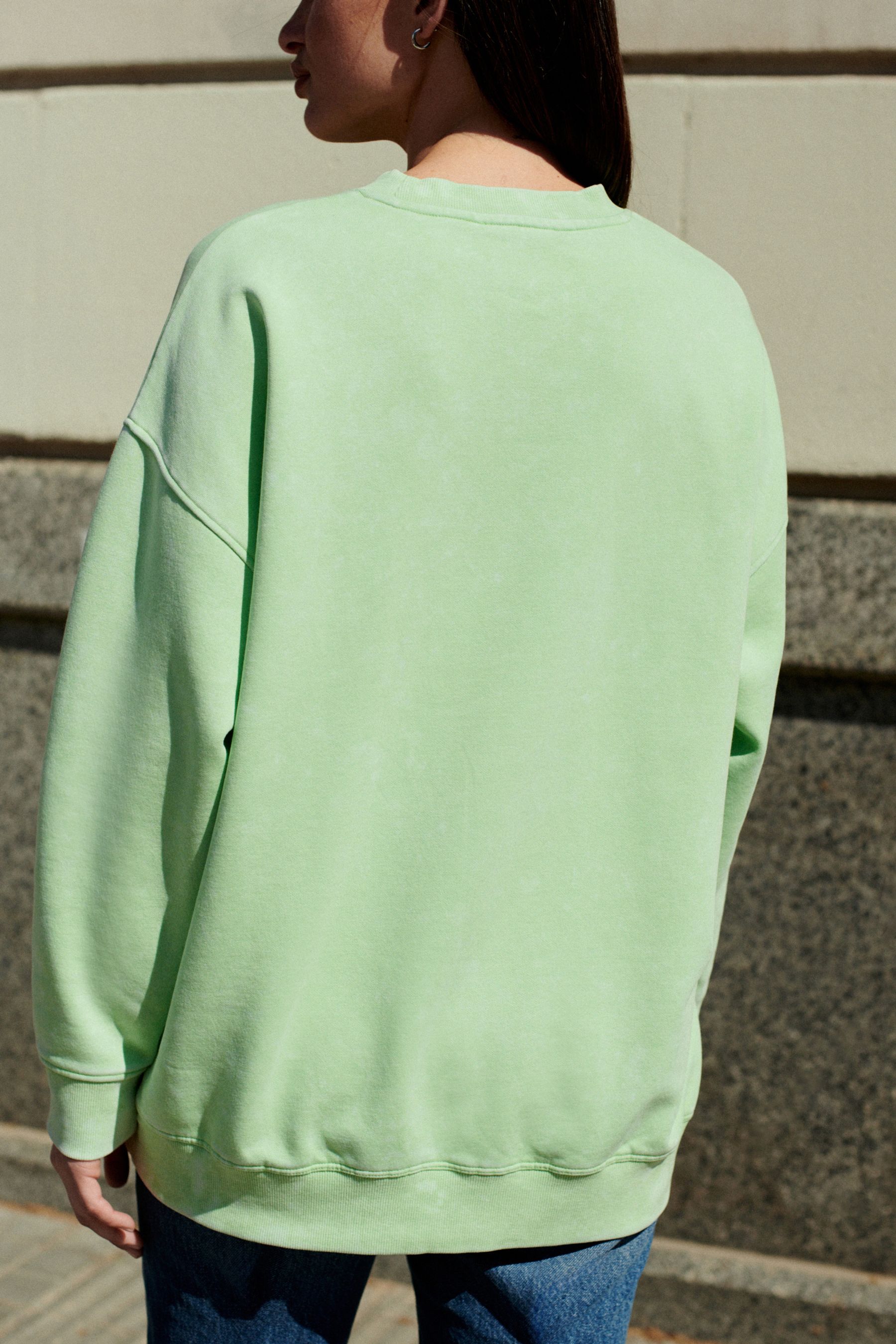 Buy Lime Green License Nirvana Bright Washed Slogan Graphic Sweatshirt from the Next UK online shop