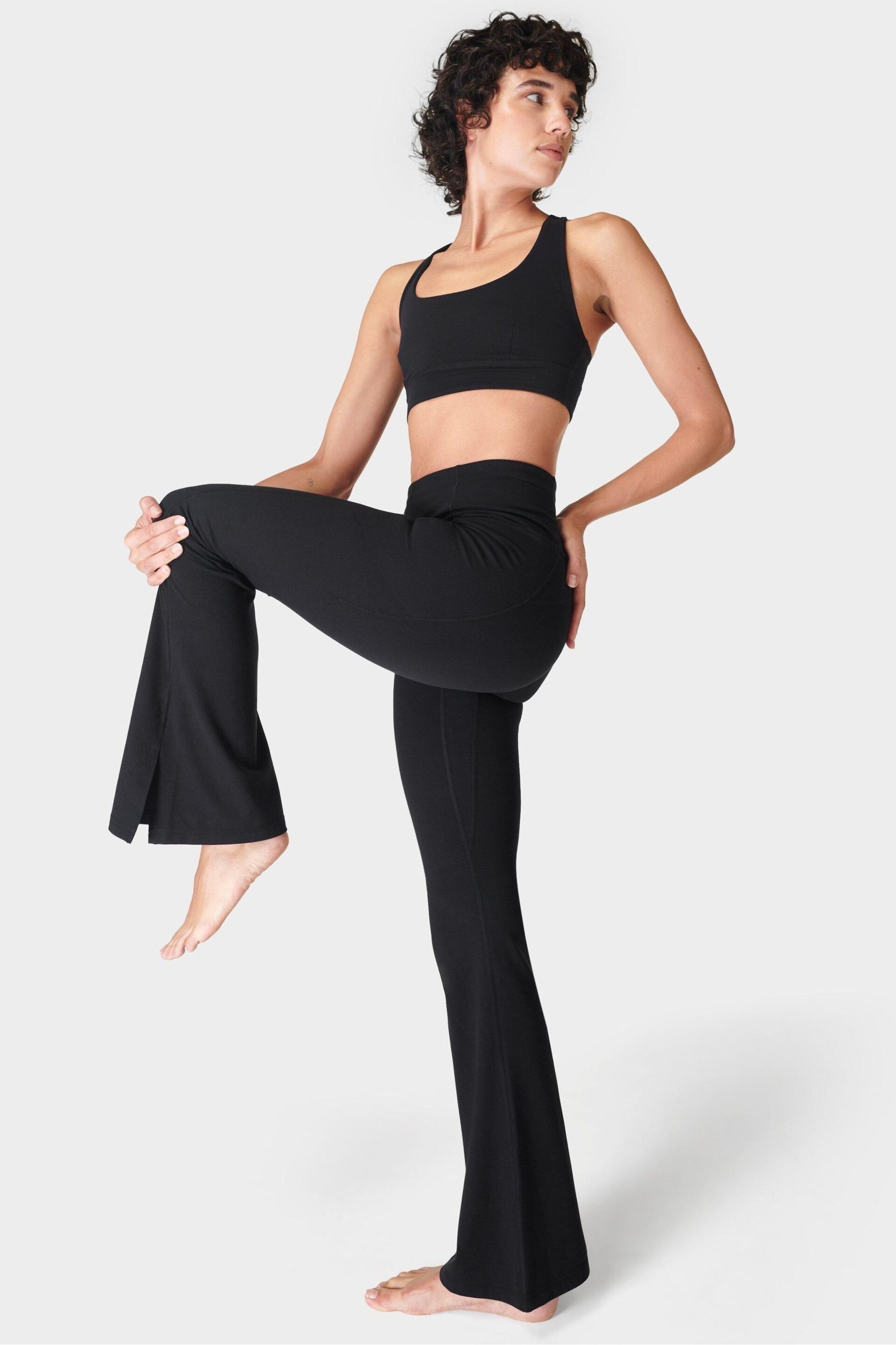 Sweaty Betty Black Super Soft Flare 30" Yoga Trousers - Image 1 of 8