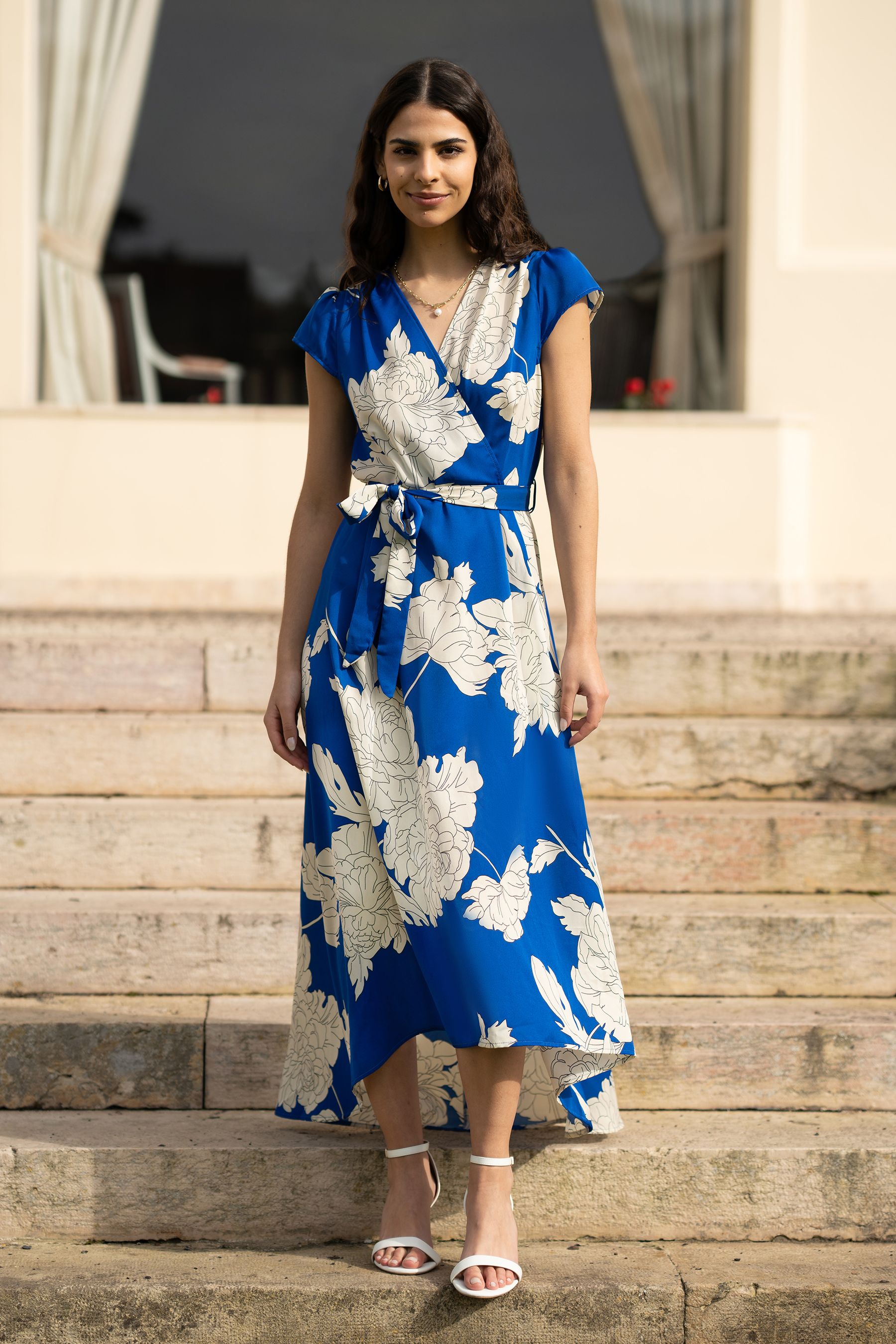 Buy Mela Blue Blossom Print Wrap Midi Dress With Dipped Hem from Next Saudi Arabia