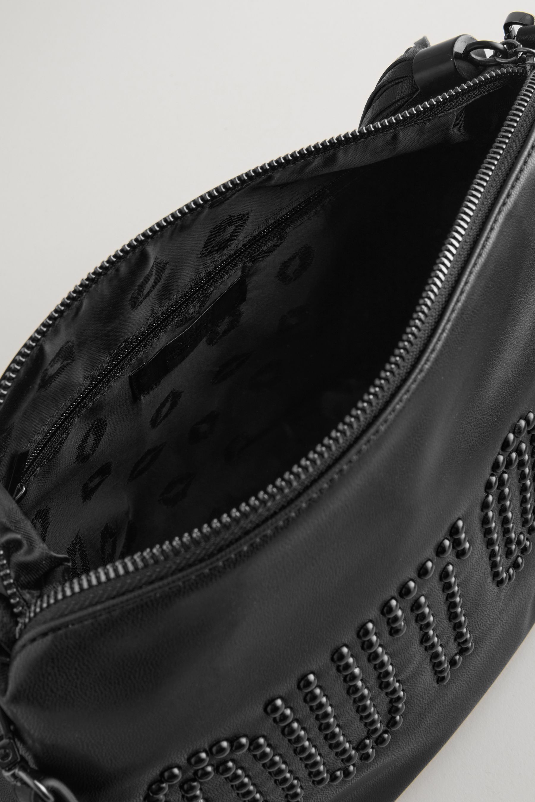 Buy Rockett St George Black Out Out Clutch Bag from the Next UK online shop