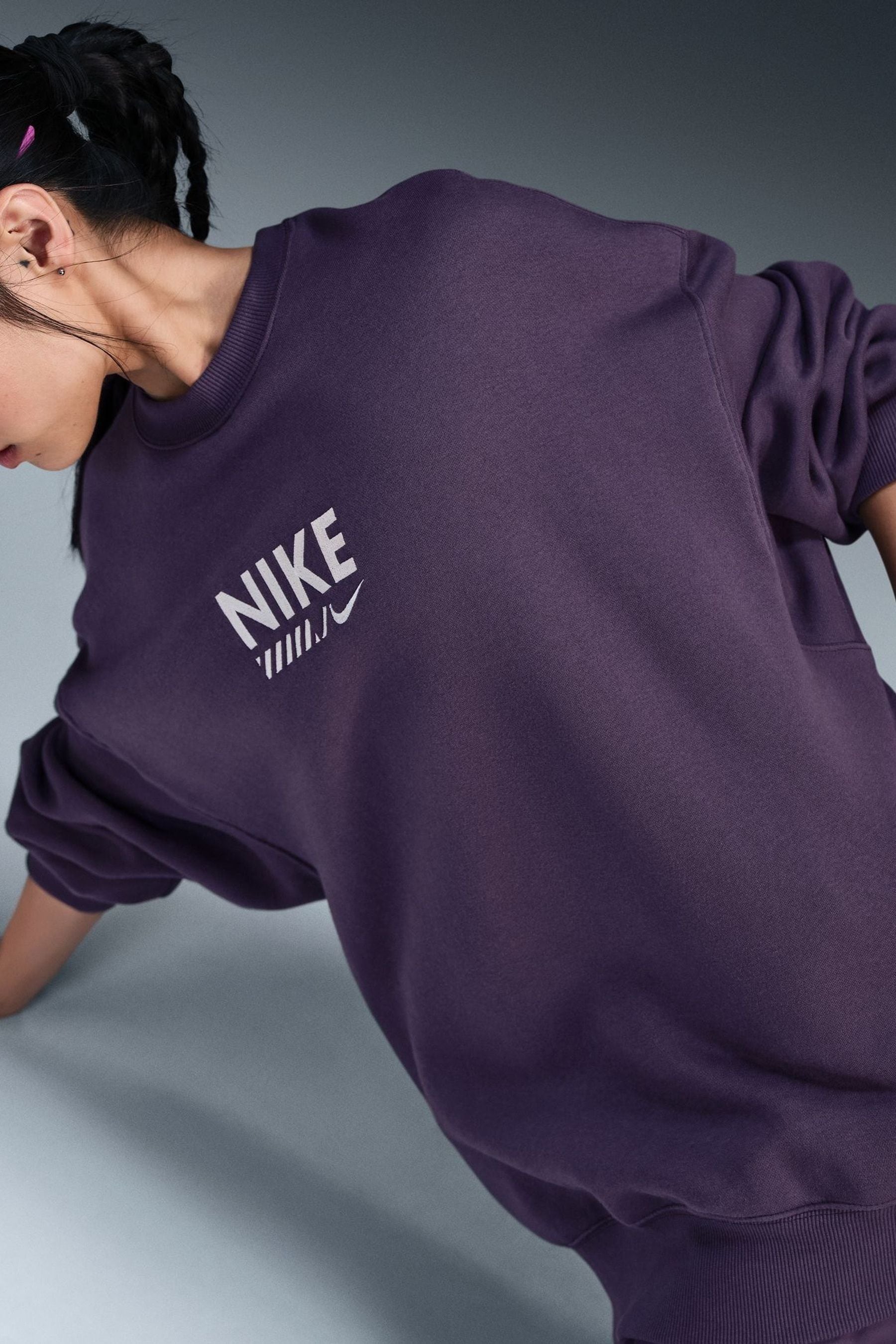 Buy Nike Purple Crew Neck Logo Backprint Sweatshirt from Next Ireland