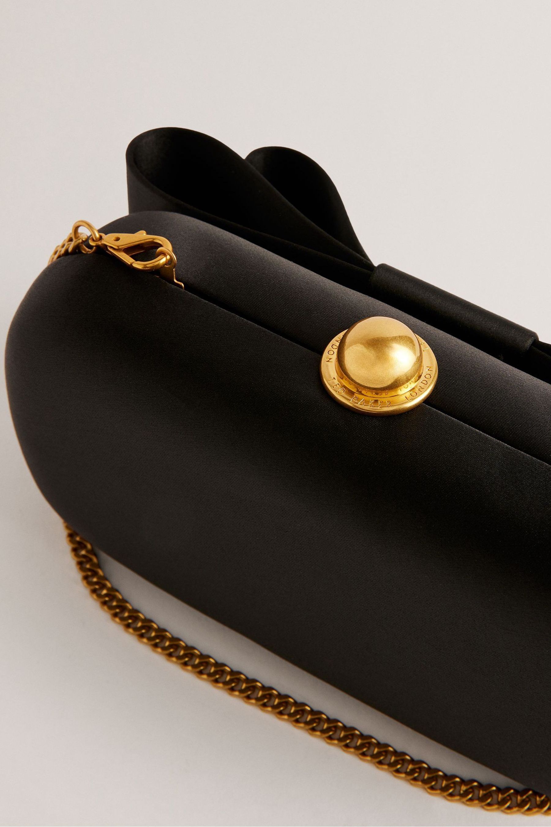 Ted baker black clutch bag clearance