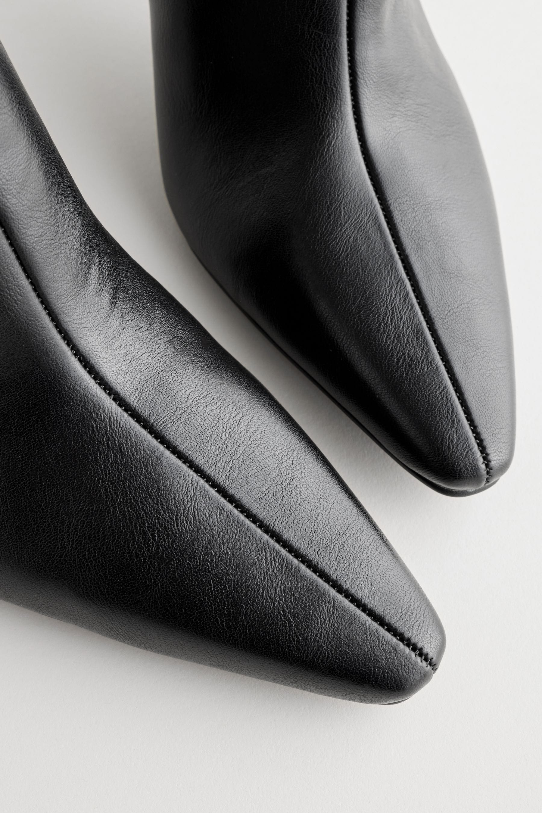 Pointed flat ankle boots discount