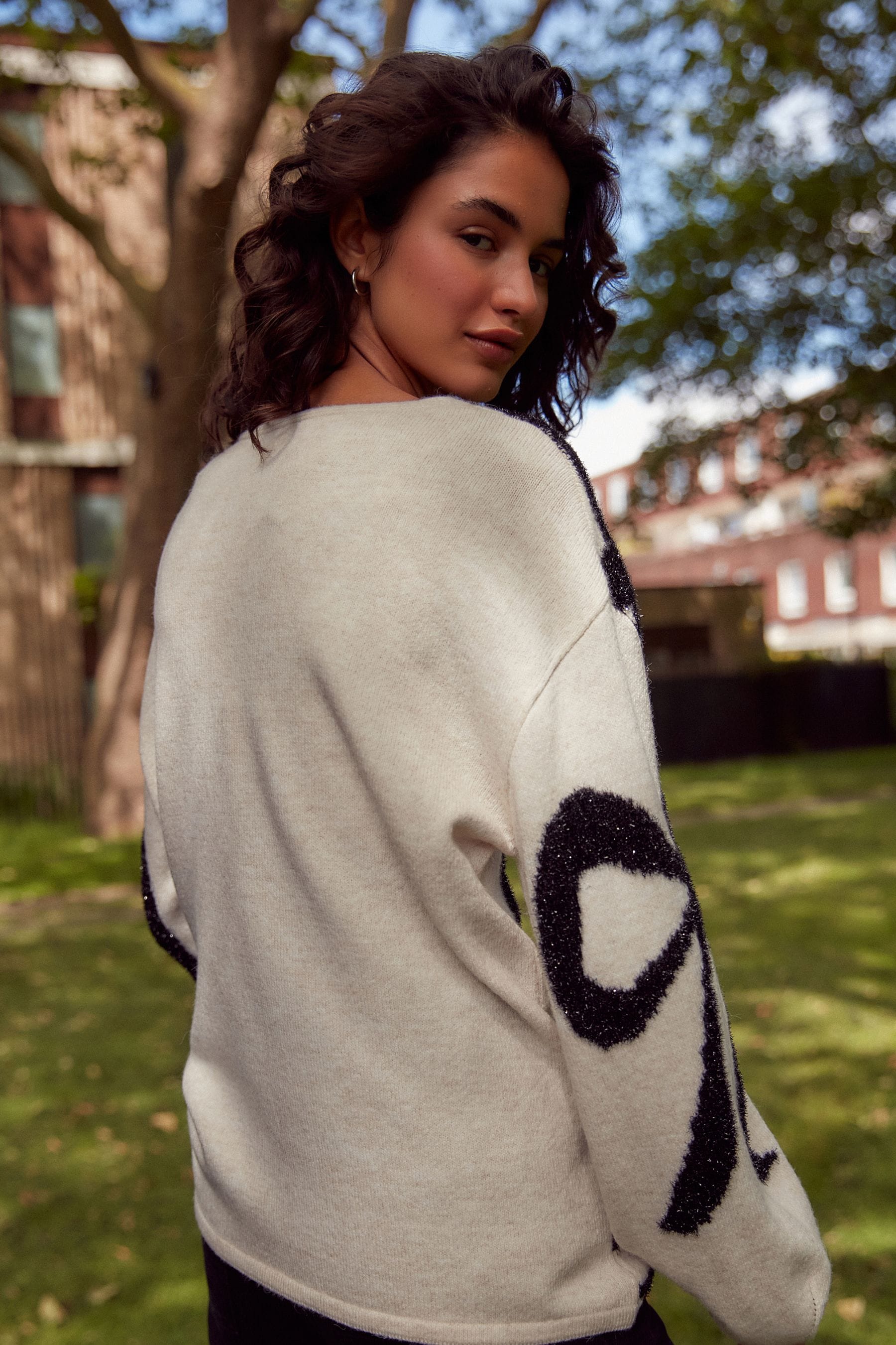Buy White and Black Tinsel Bow Knitted Christmas Jumper from the Next UK online shop