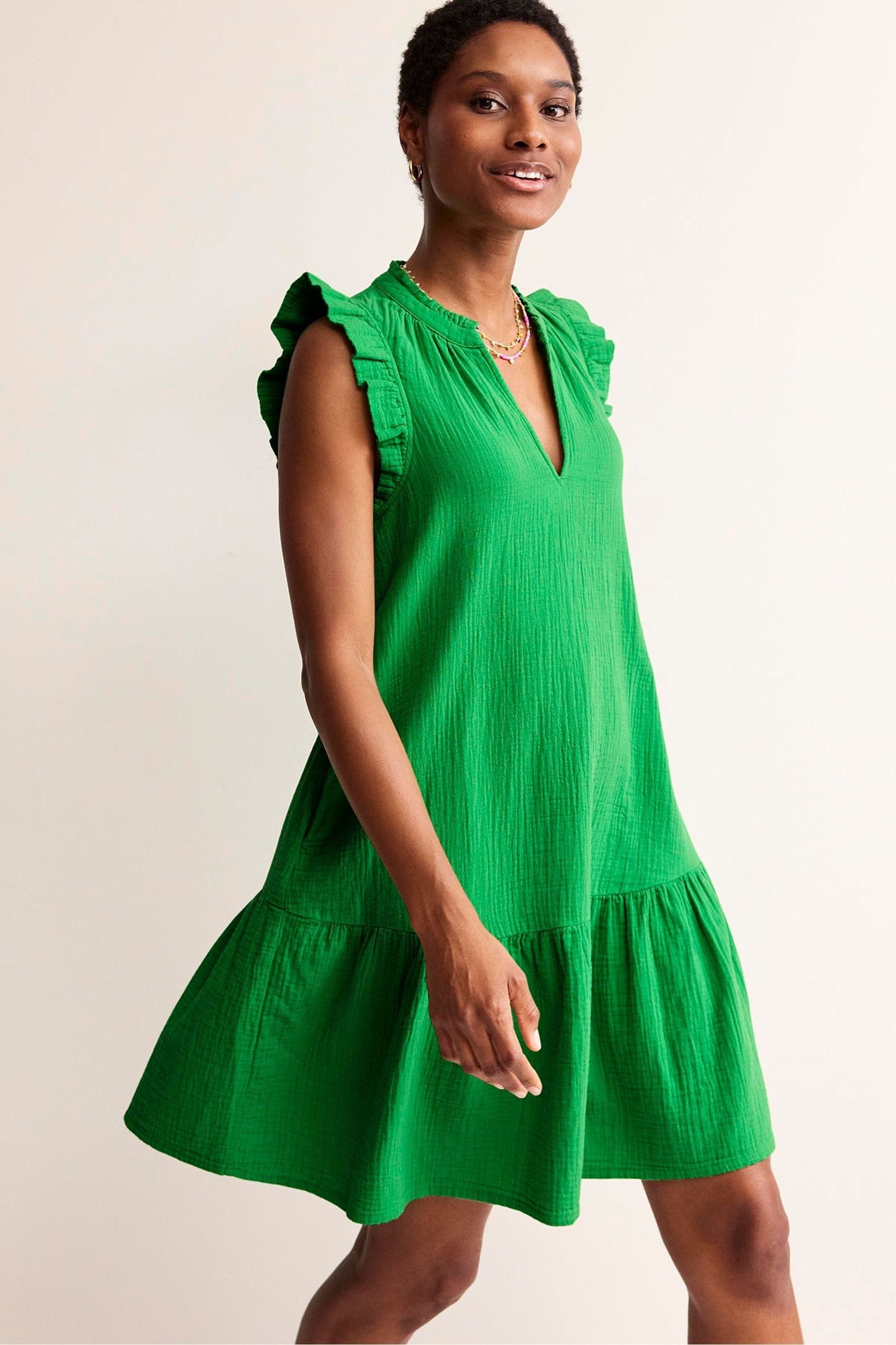 Green dress with daisies shop